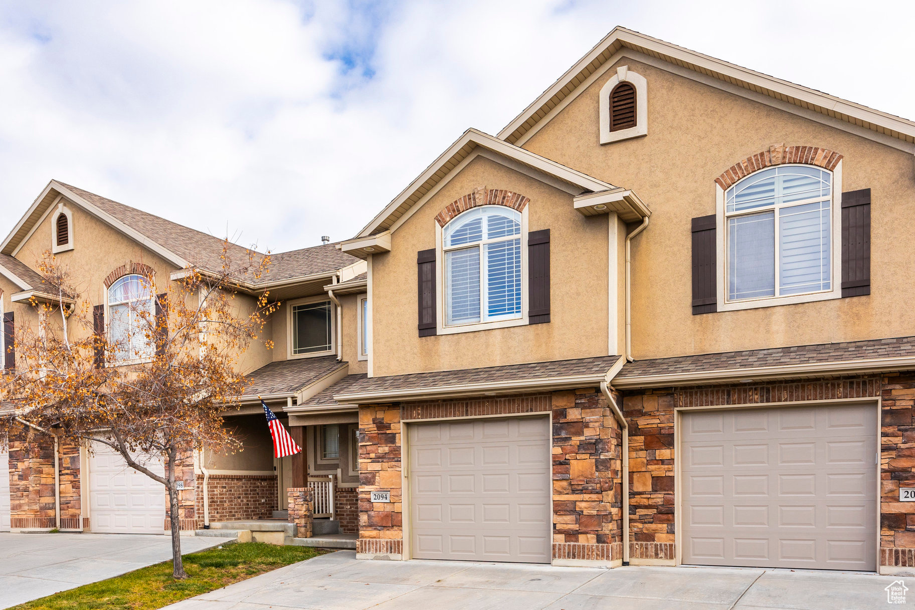 Multi unit property featuring a garage