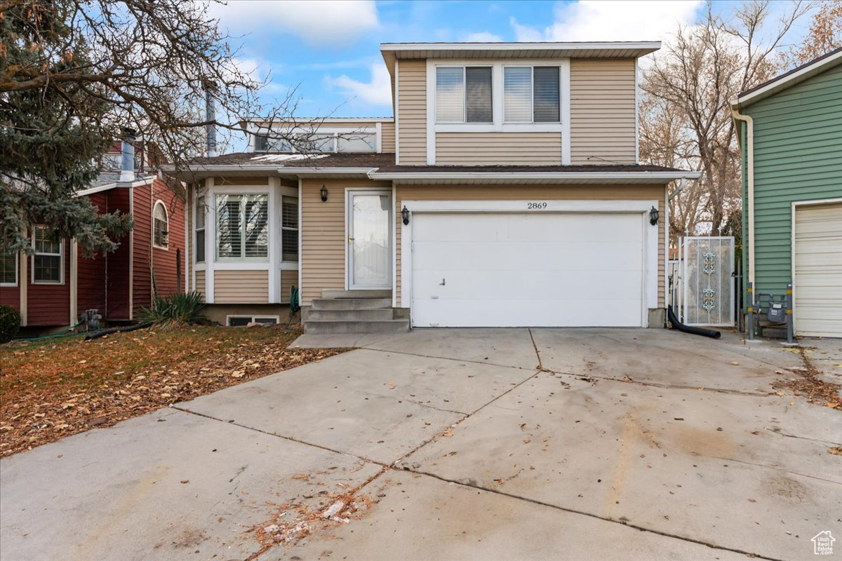 View of front property with a garage