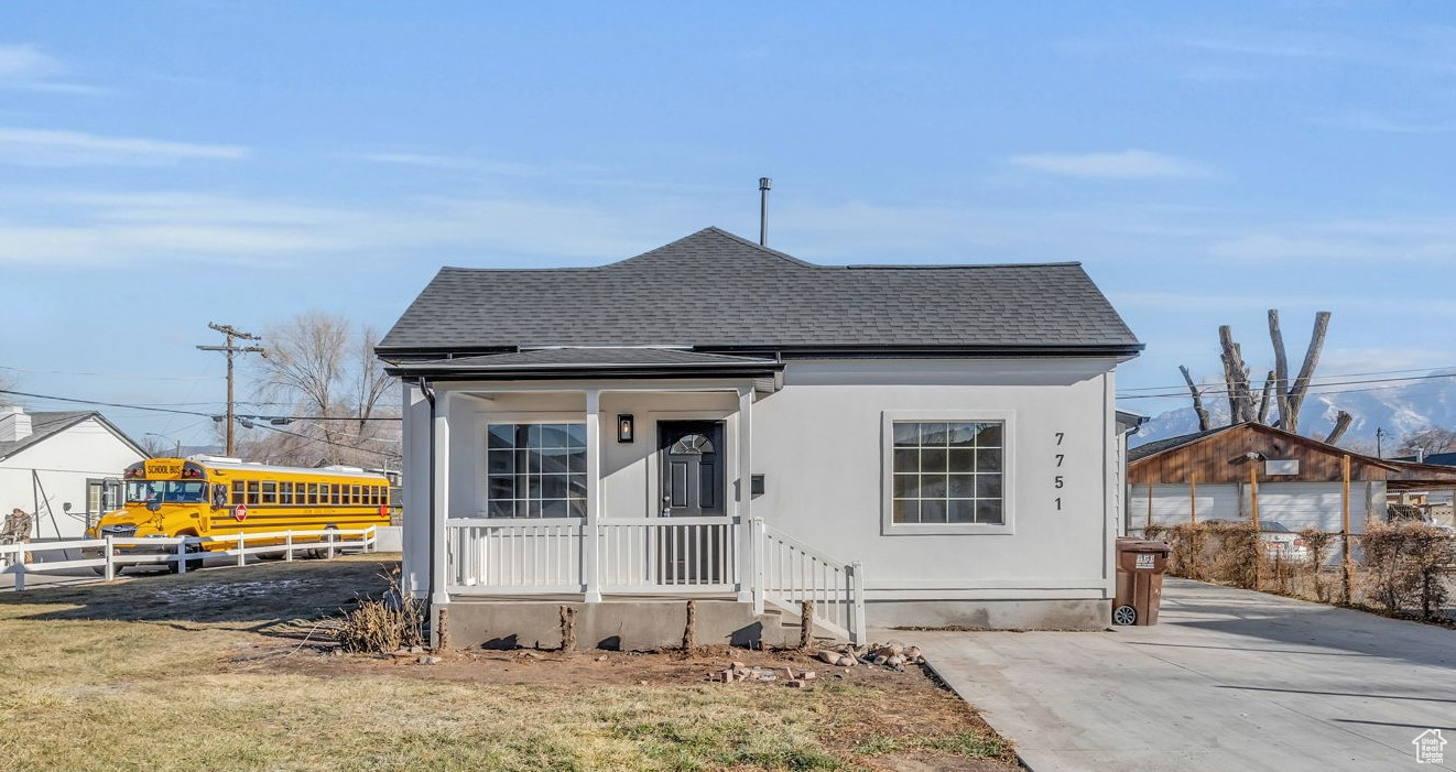 Bungalow-style home featuring a front yard