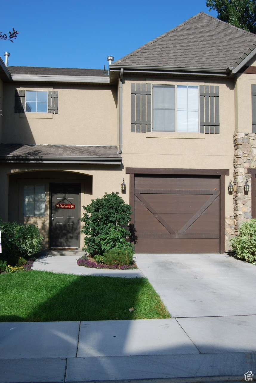 View of front of home with a garage