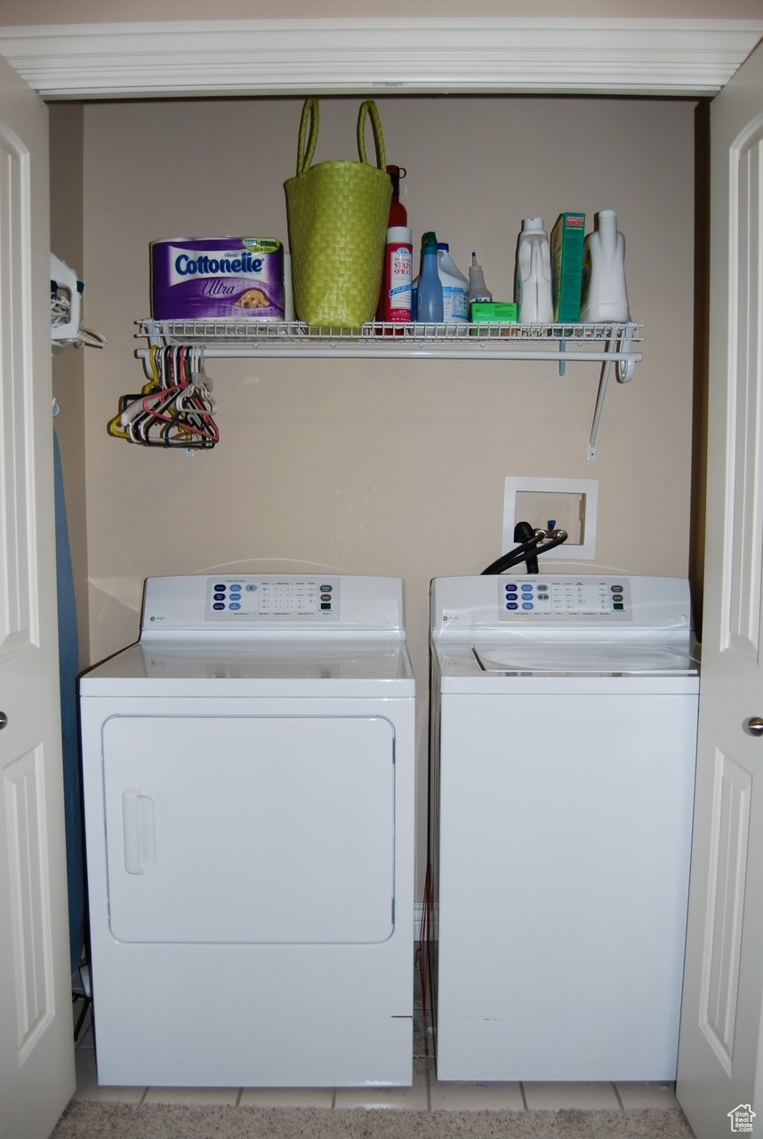 Laundry room with separate washer and dryer