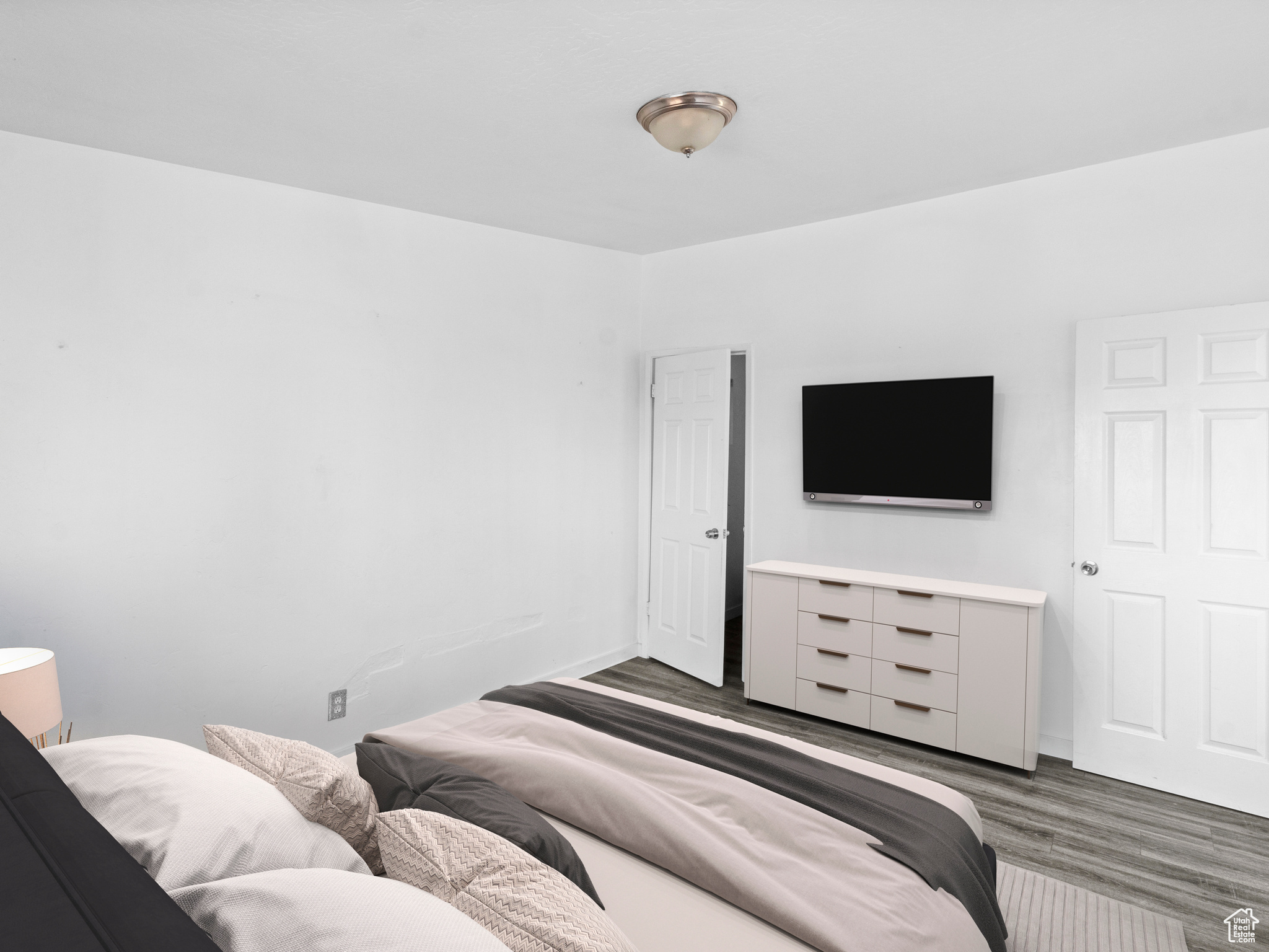 Bedroom 1 featuring dark hardwood / wood-style floors