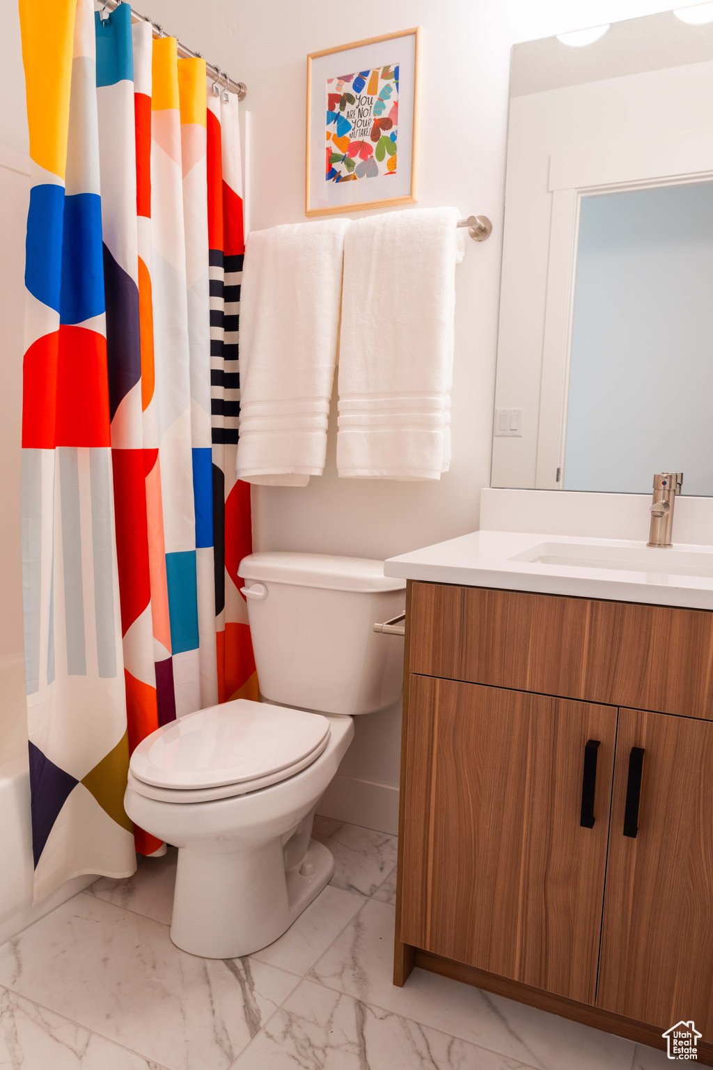 Bathroom with vanity and toilet