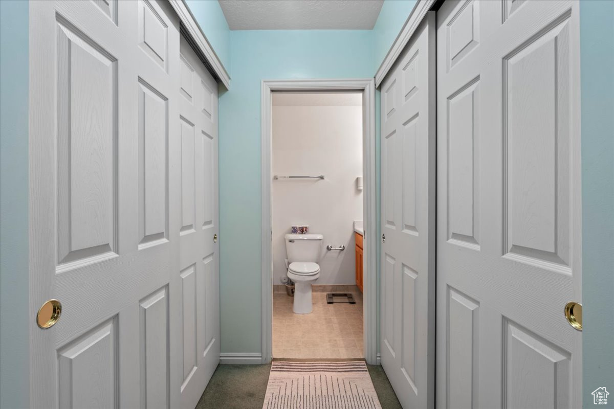 Bathroom with vanity and toilet