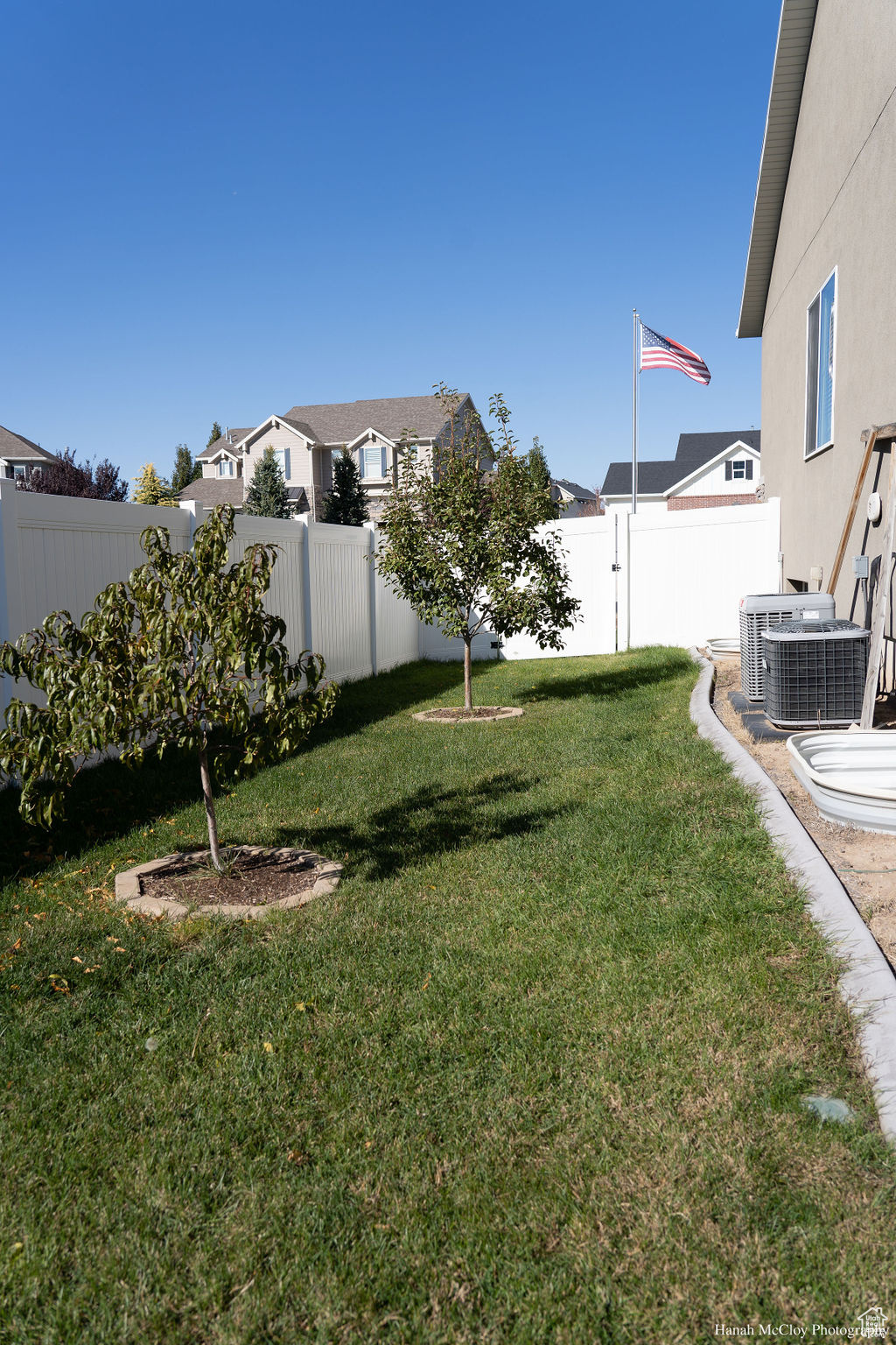 View of yard featuring central air condition unit