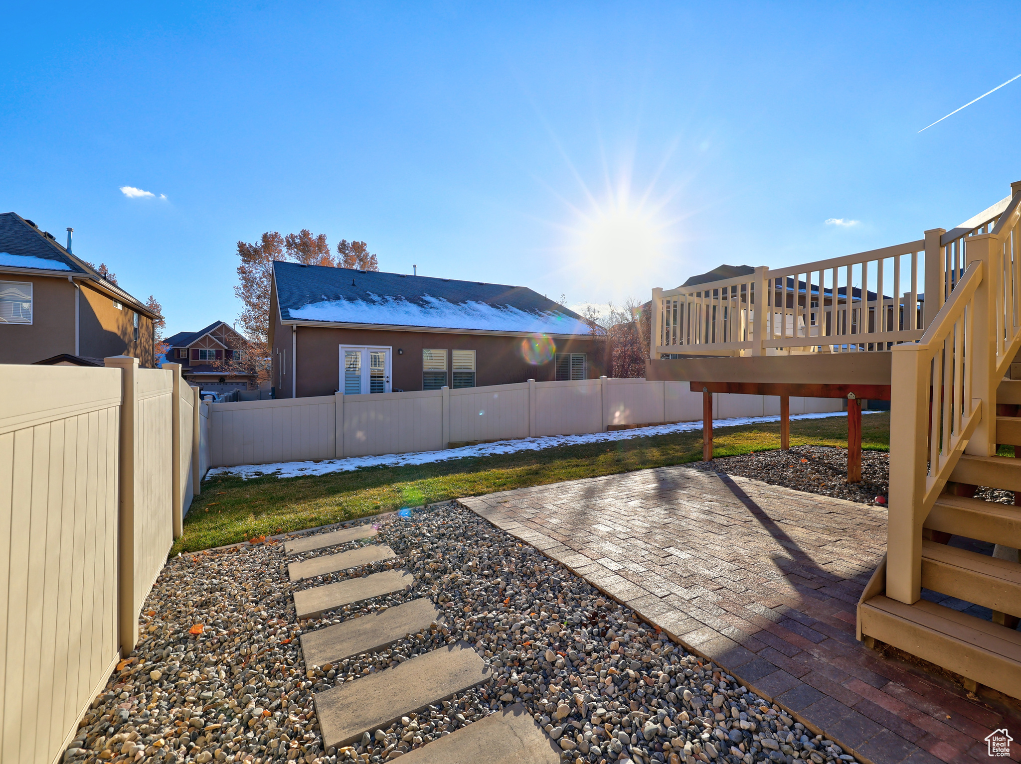 View of yard featuring a patio area and a wooden deck