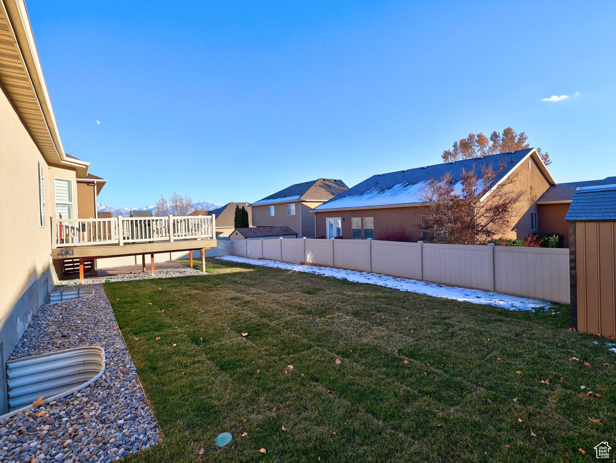 View of yard with a deck