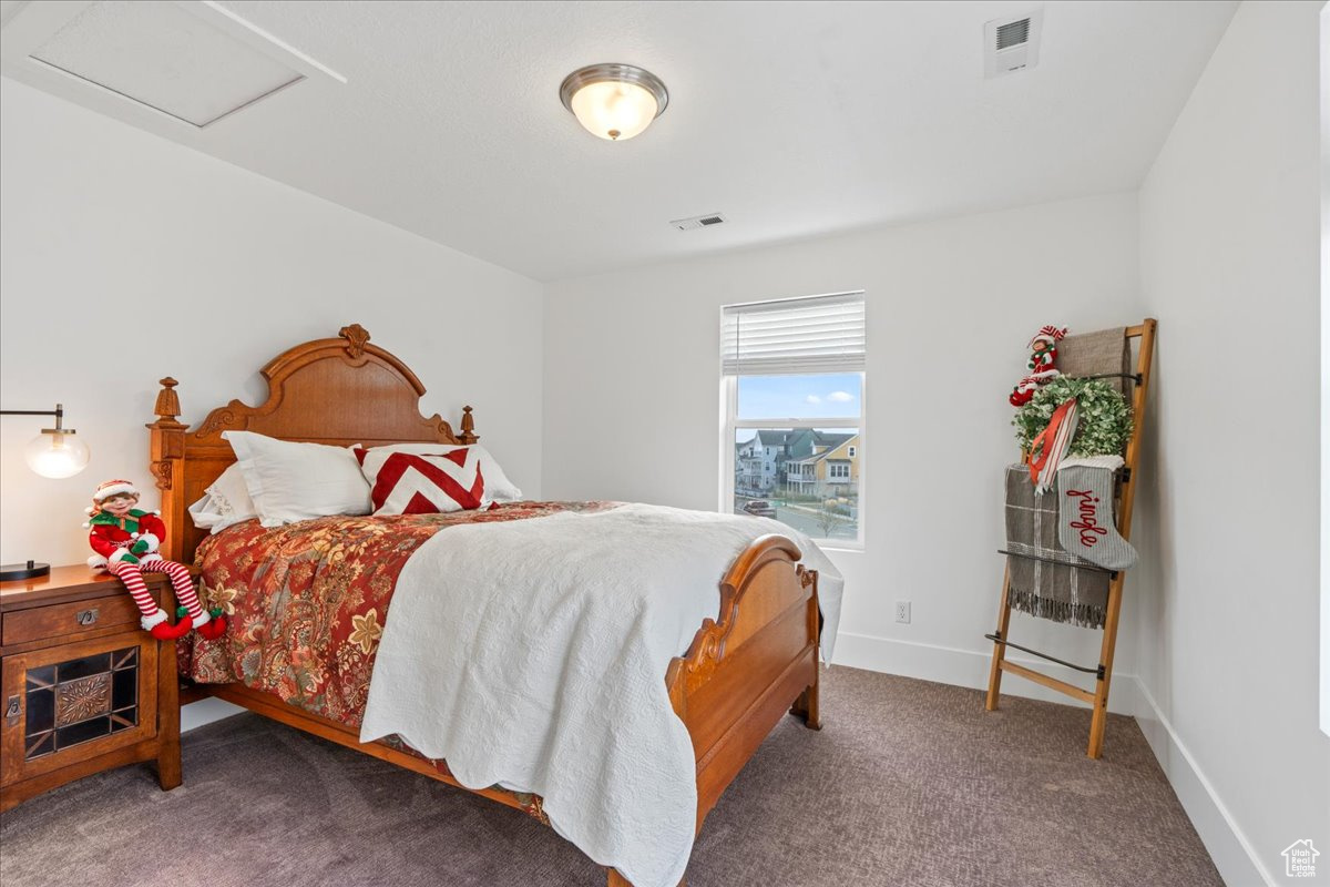 Bedroom featuring carpet floors