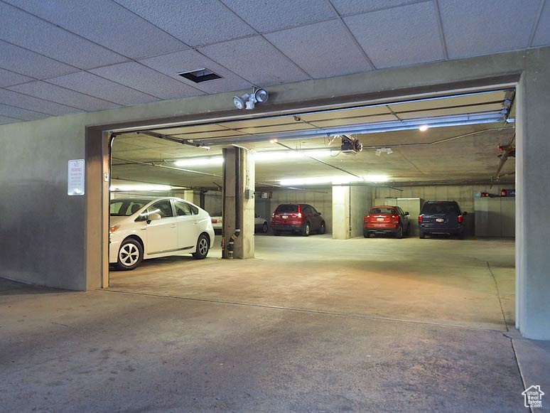 Garage featuring a garage door opener