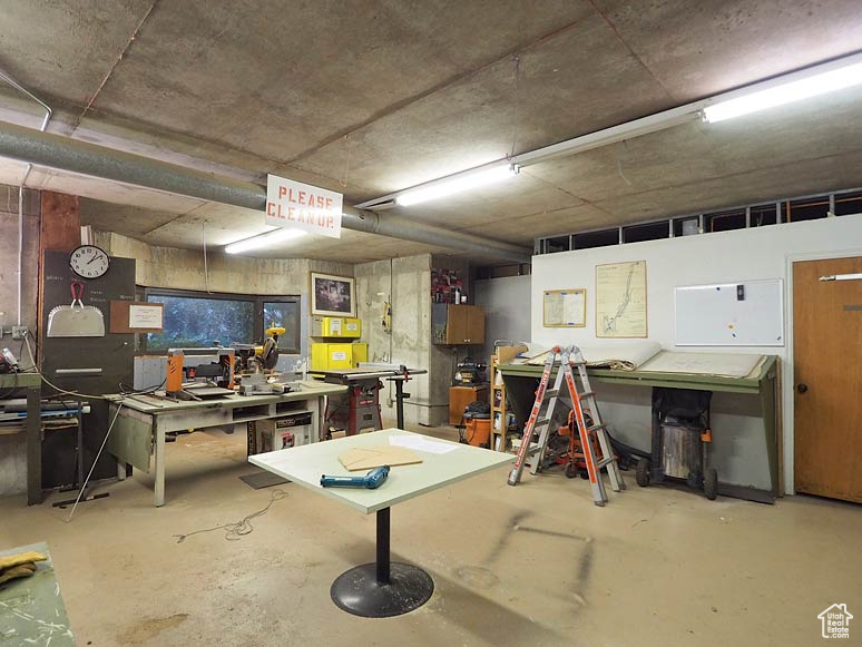 Interior space featuring a workshop area and concrete floors