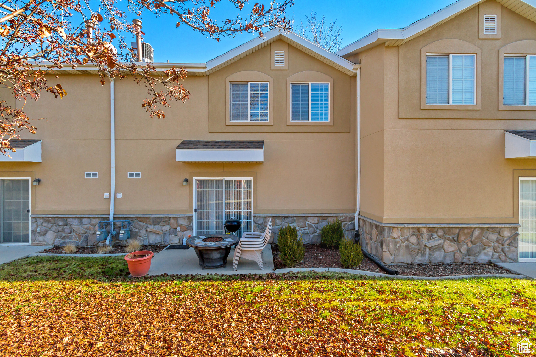 Back of house with a patio area