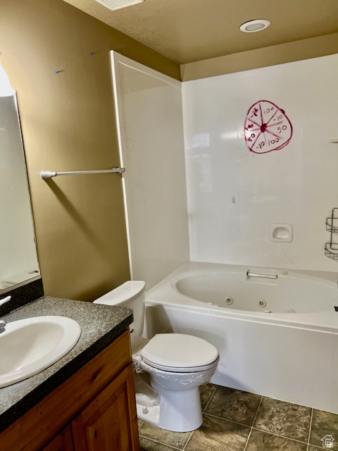 Full bathroom with shower/bathing tub combination, vanity, and toilet in the main bedroom