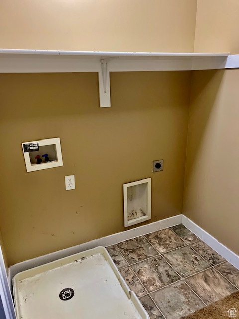 Laundry room featuring hookup for an electric dryer and hookup for a washing machine