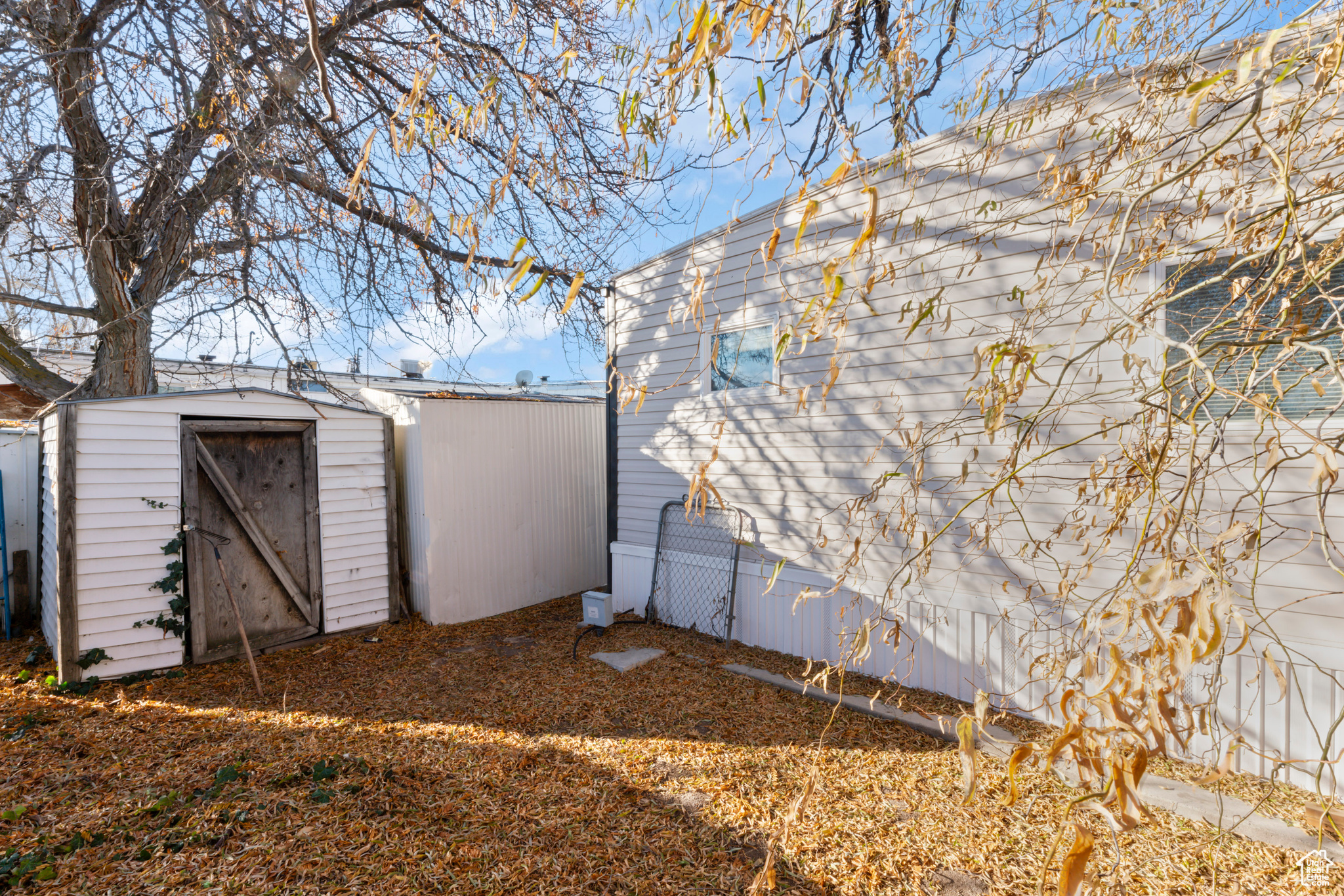 Exterior space featuring a storage shed