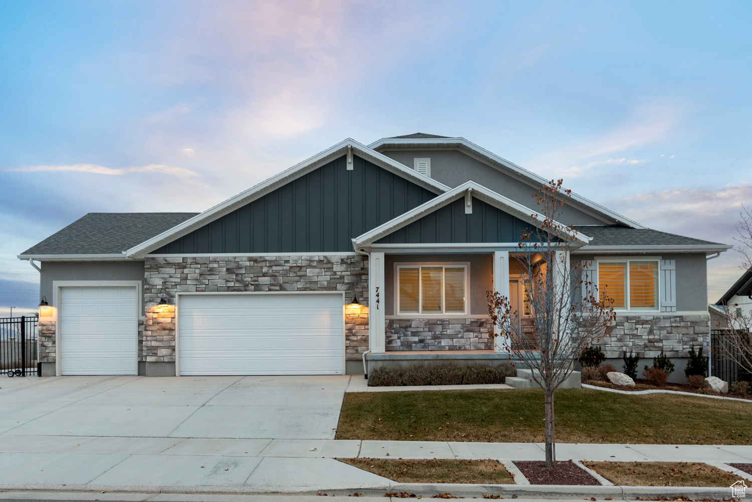 Craftsman-style home featuring a garage