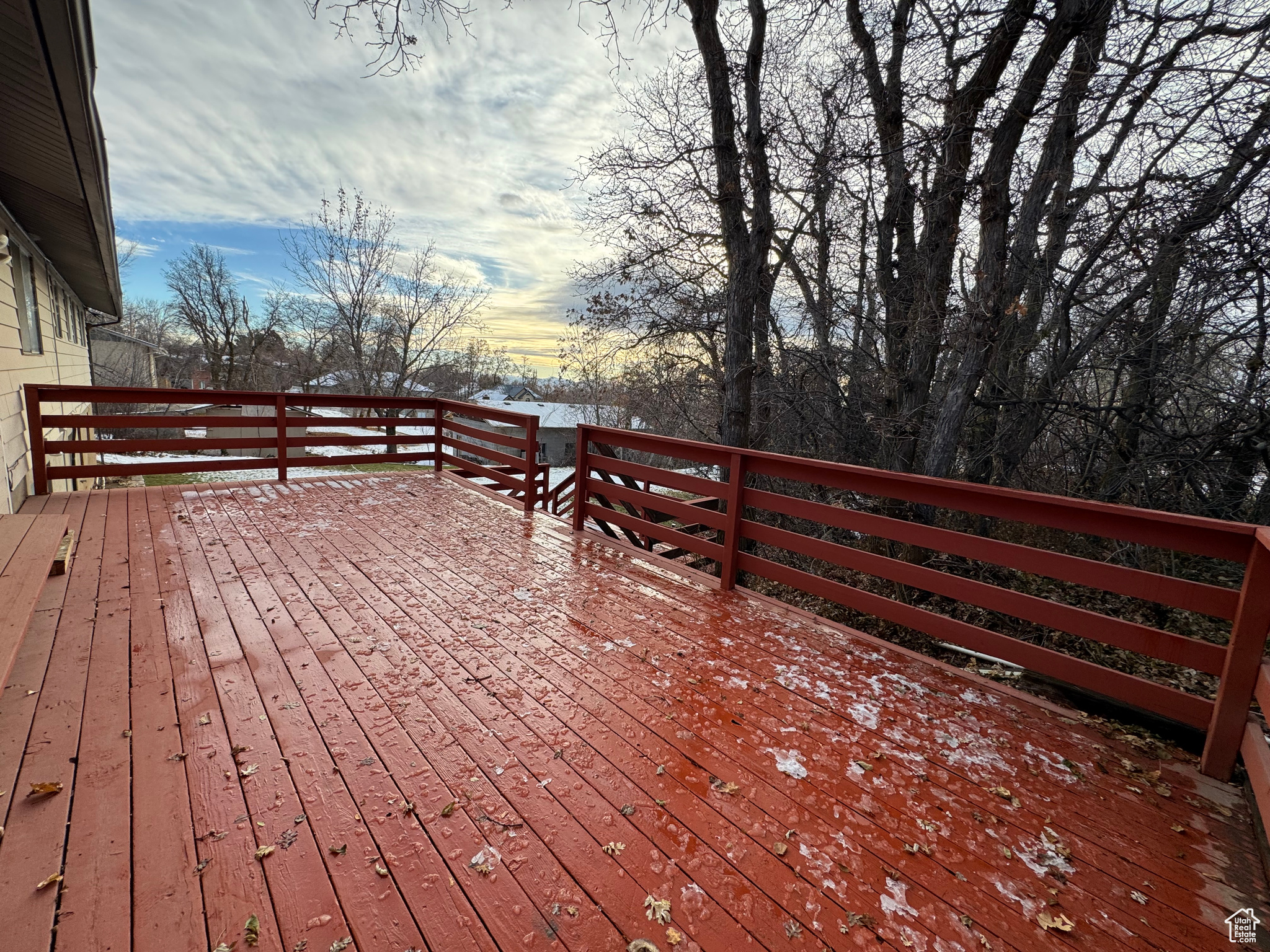 View of deck at dusk