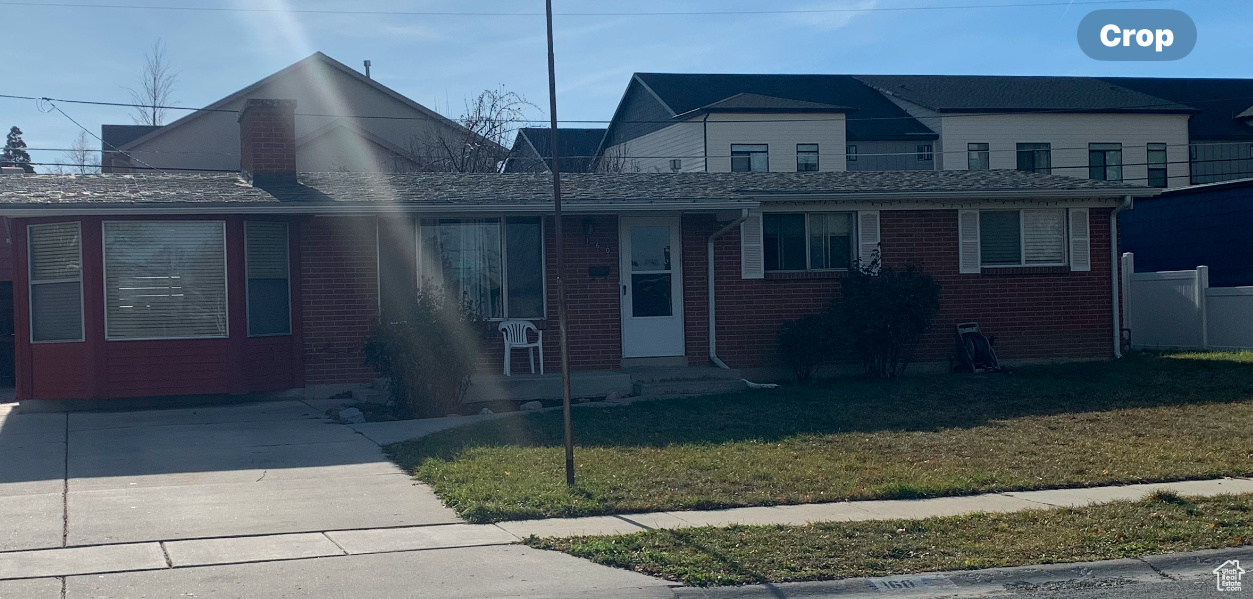 View of front of house with a front lawn