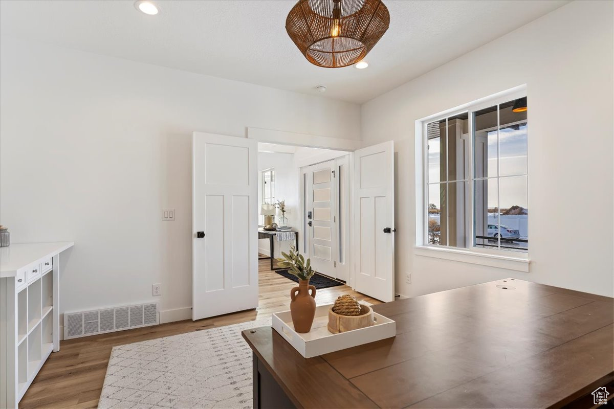 Office area featuring hardwood / wood-style floors