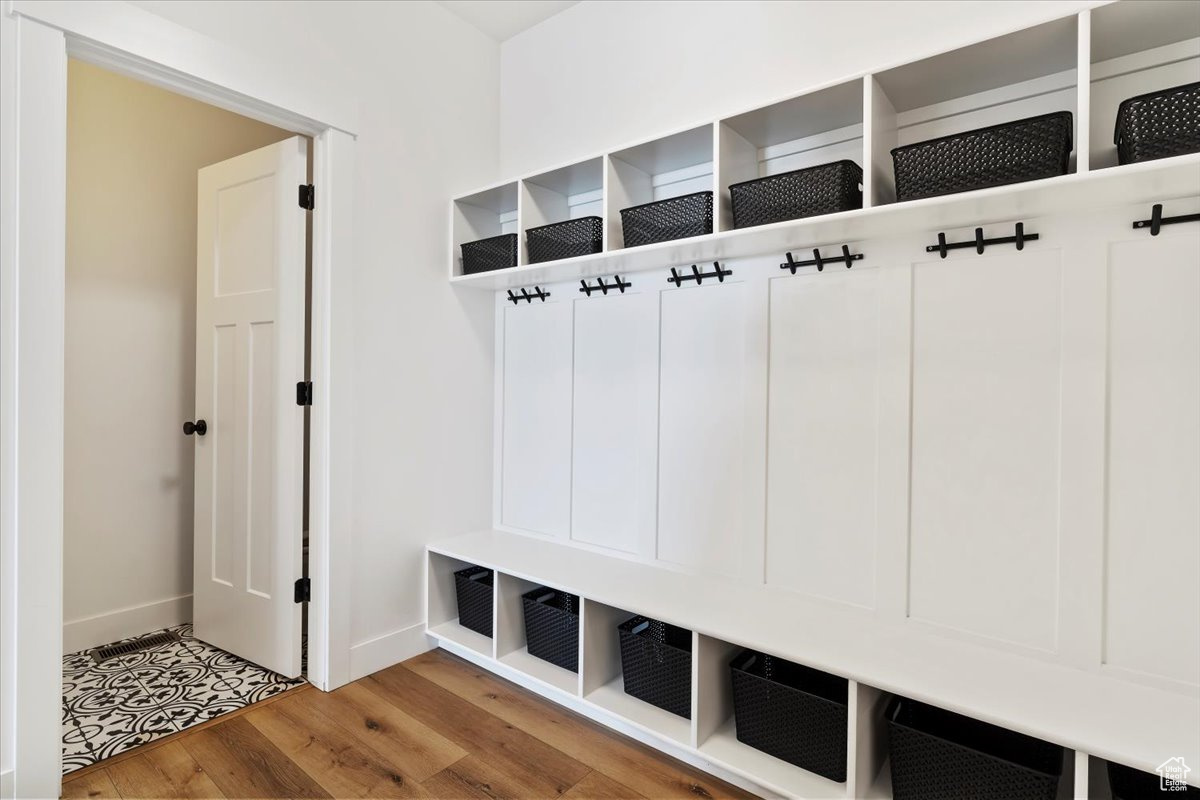 Mudroom featuring hardwood / wood-style flooring