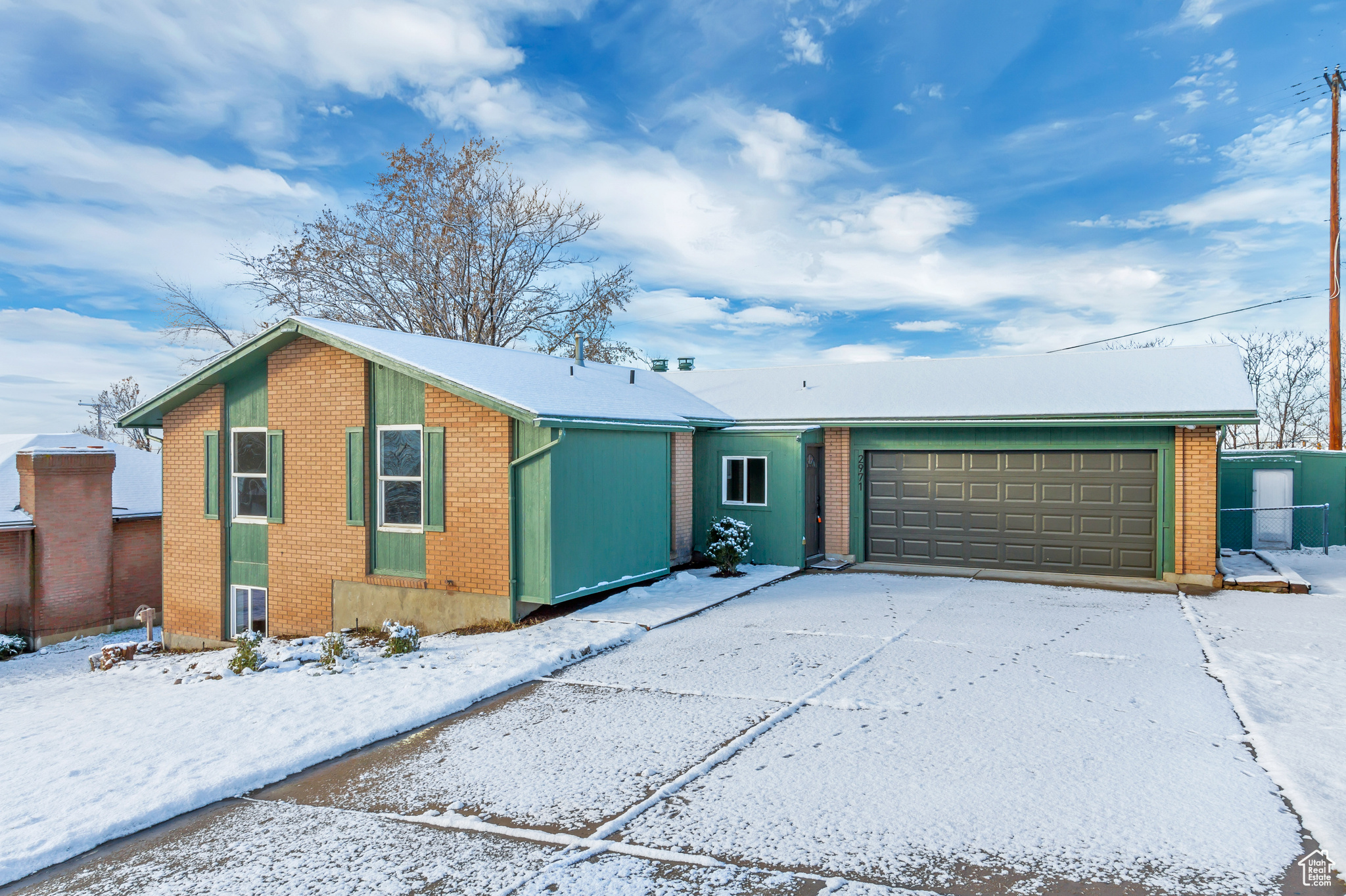 Single story home with a garage