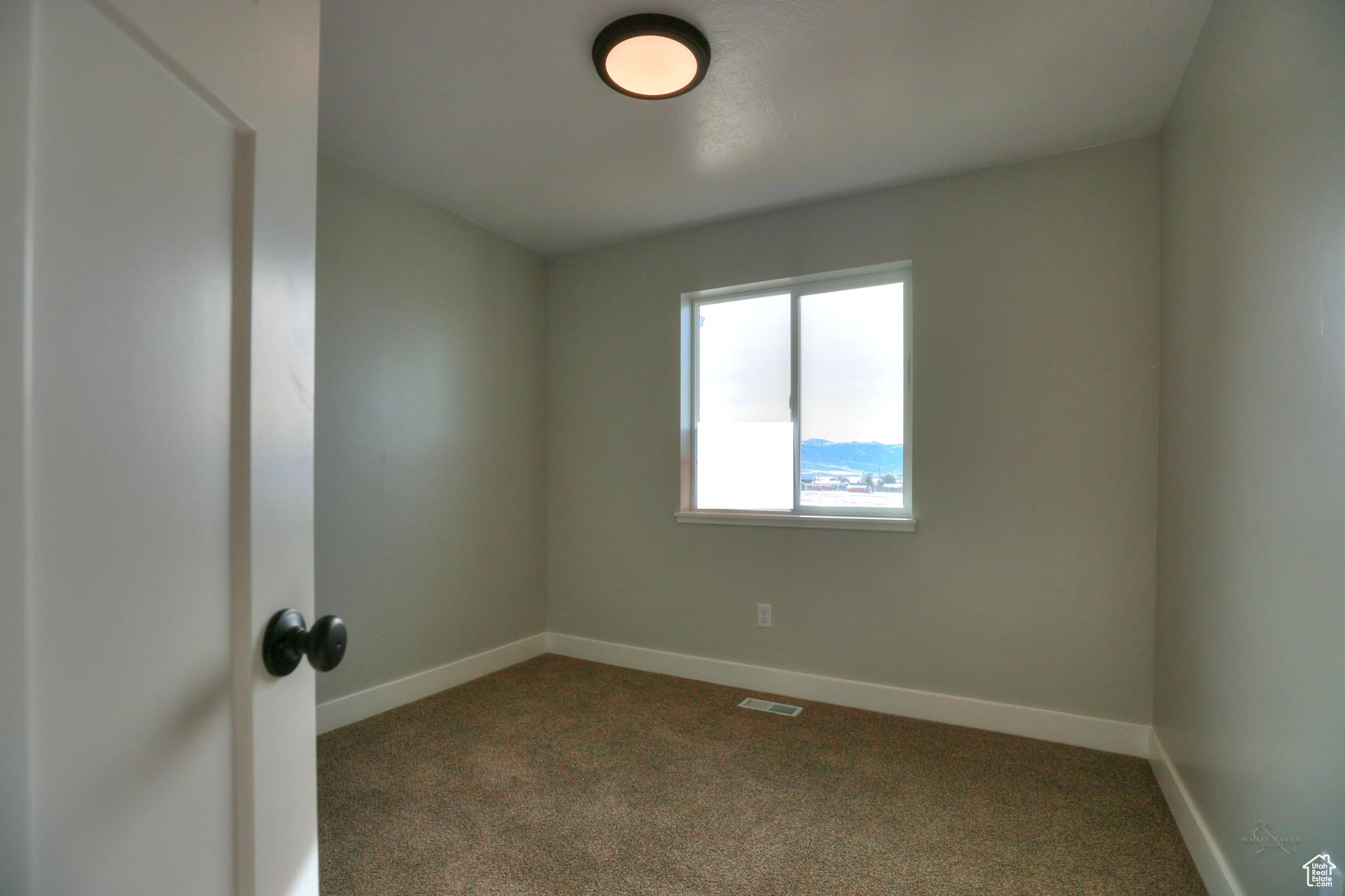 Bedroom featuring carpet