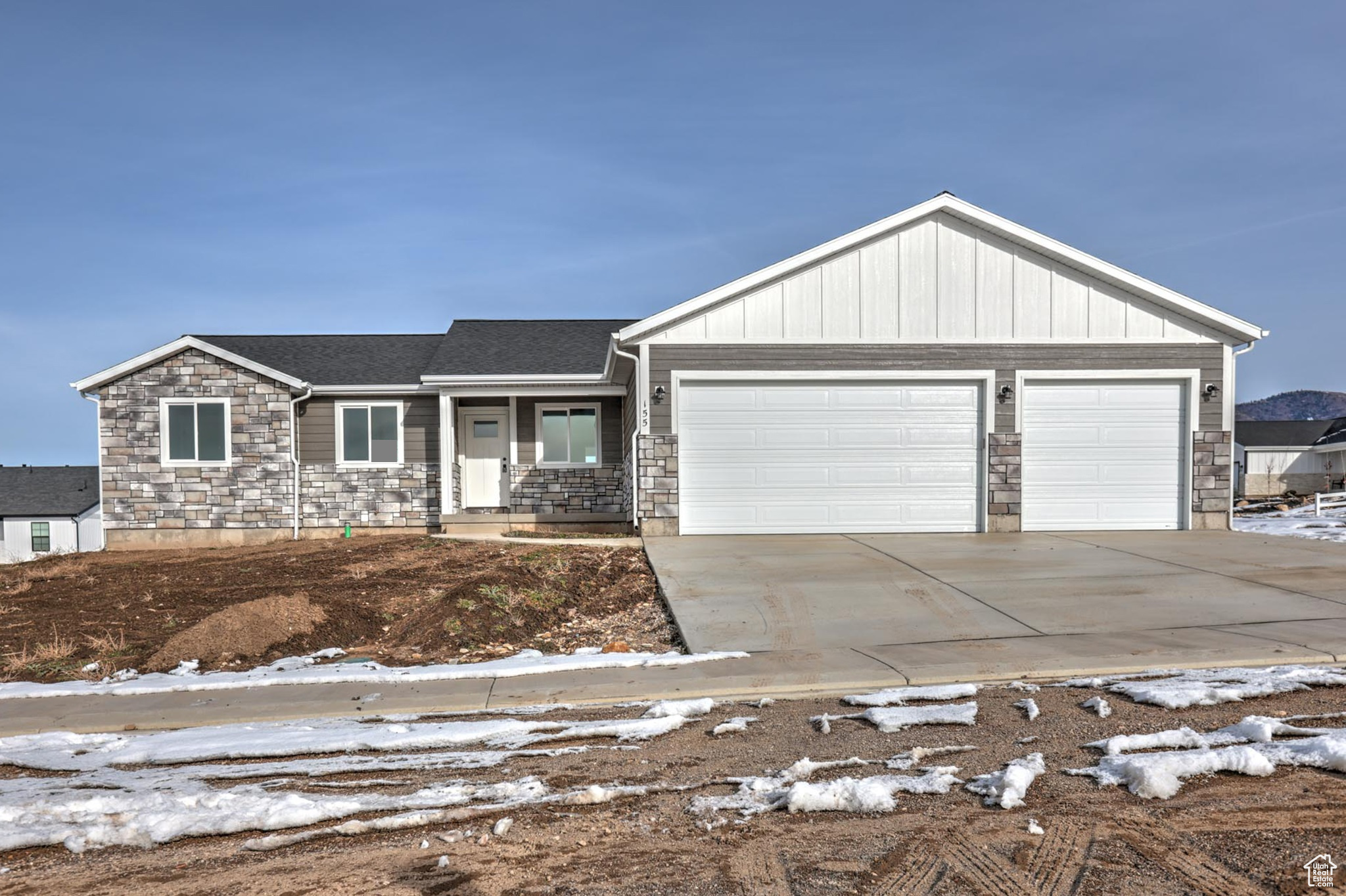 View of front of home with a garage