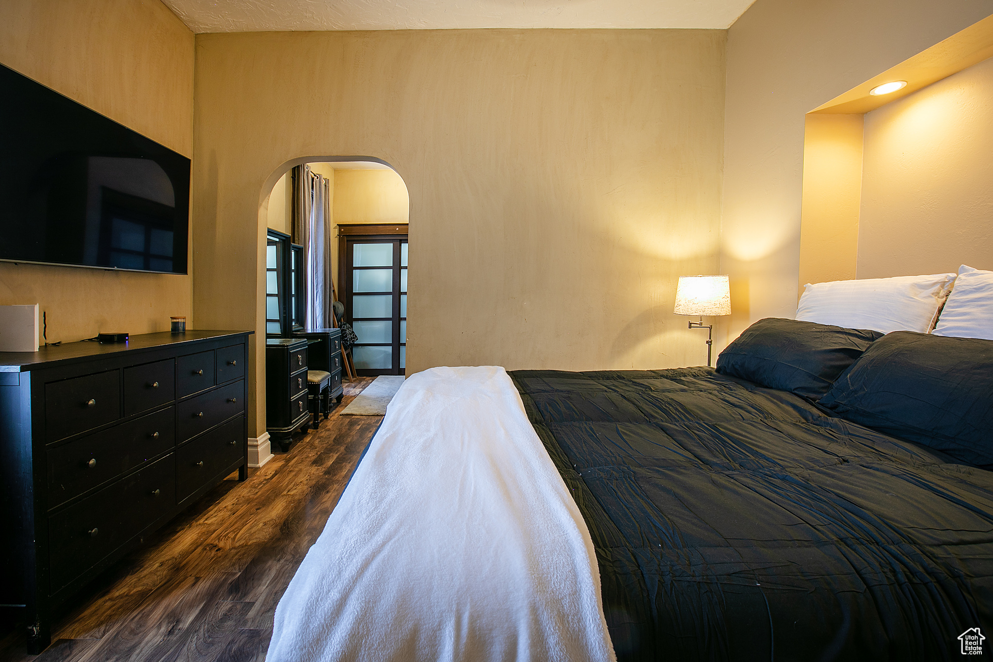 Bedroom featuring dark hardwood / wood-style floors