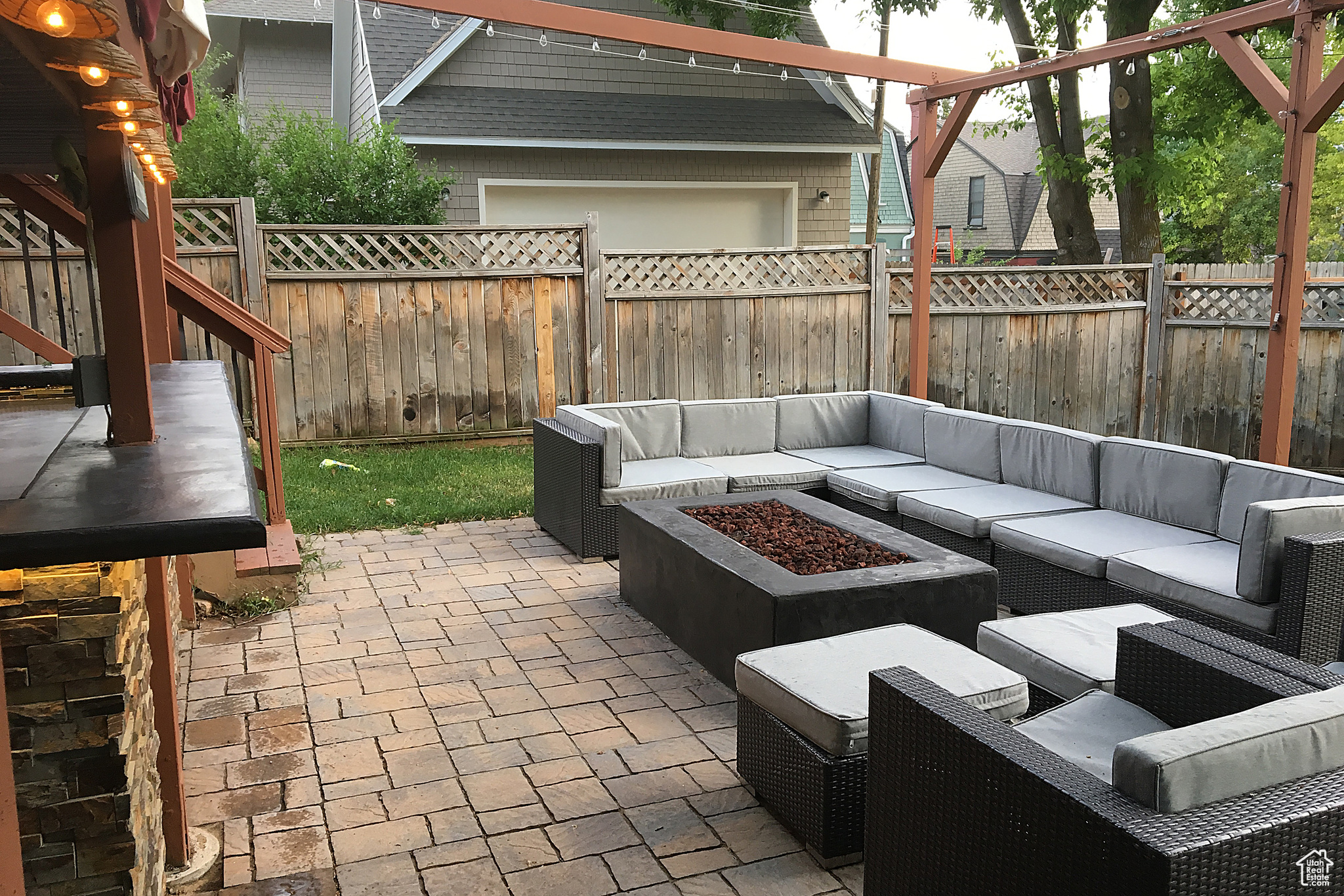 View of patio / terrace with an outdoor living space with a fire pit