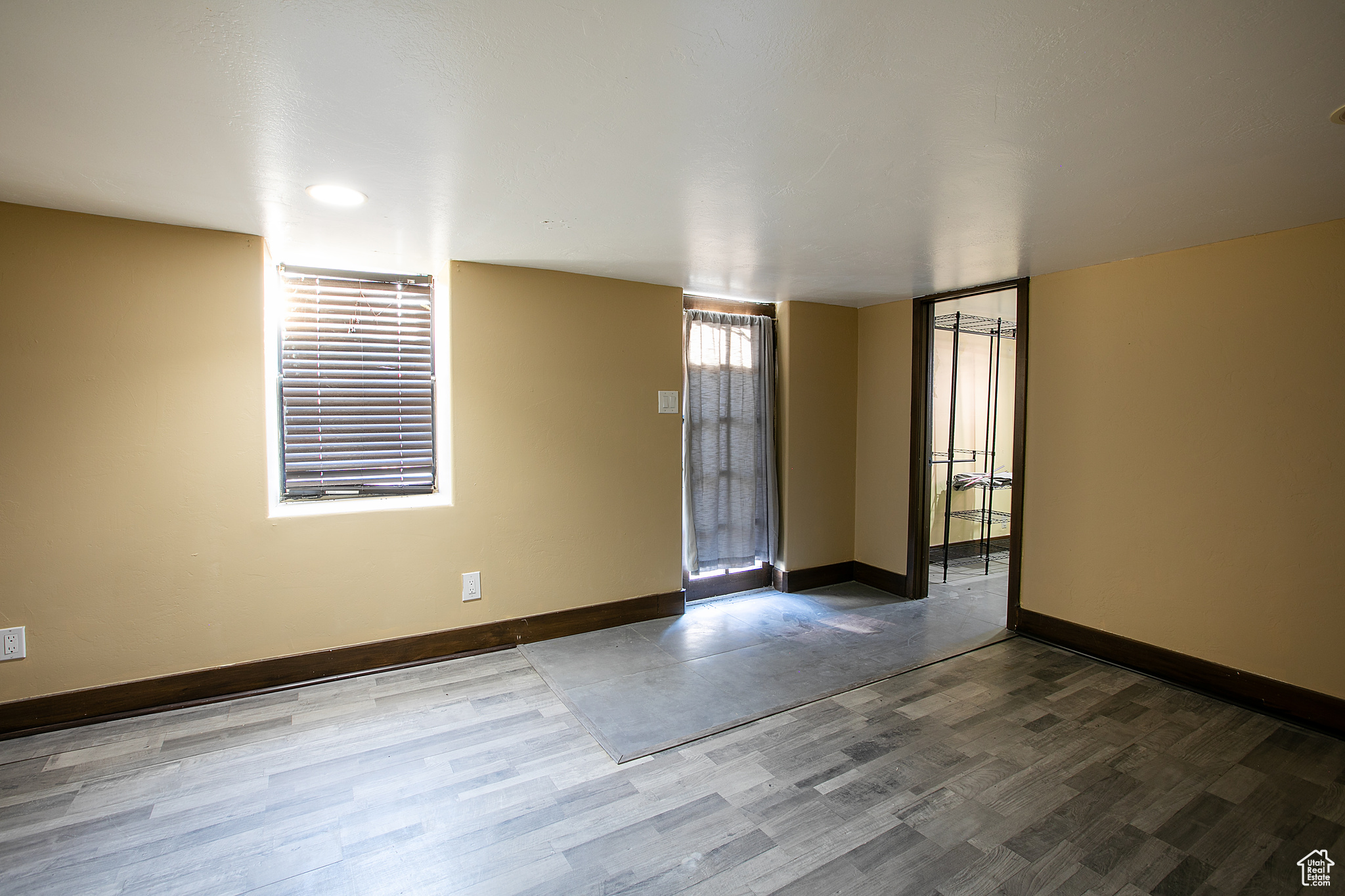 Spare room featuring hardwood / wood-style flooring