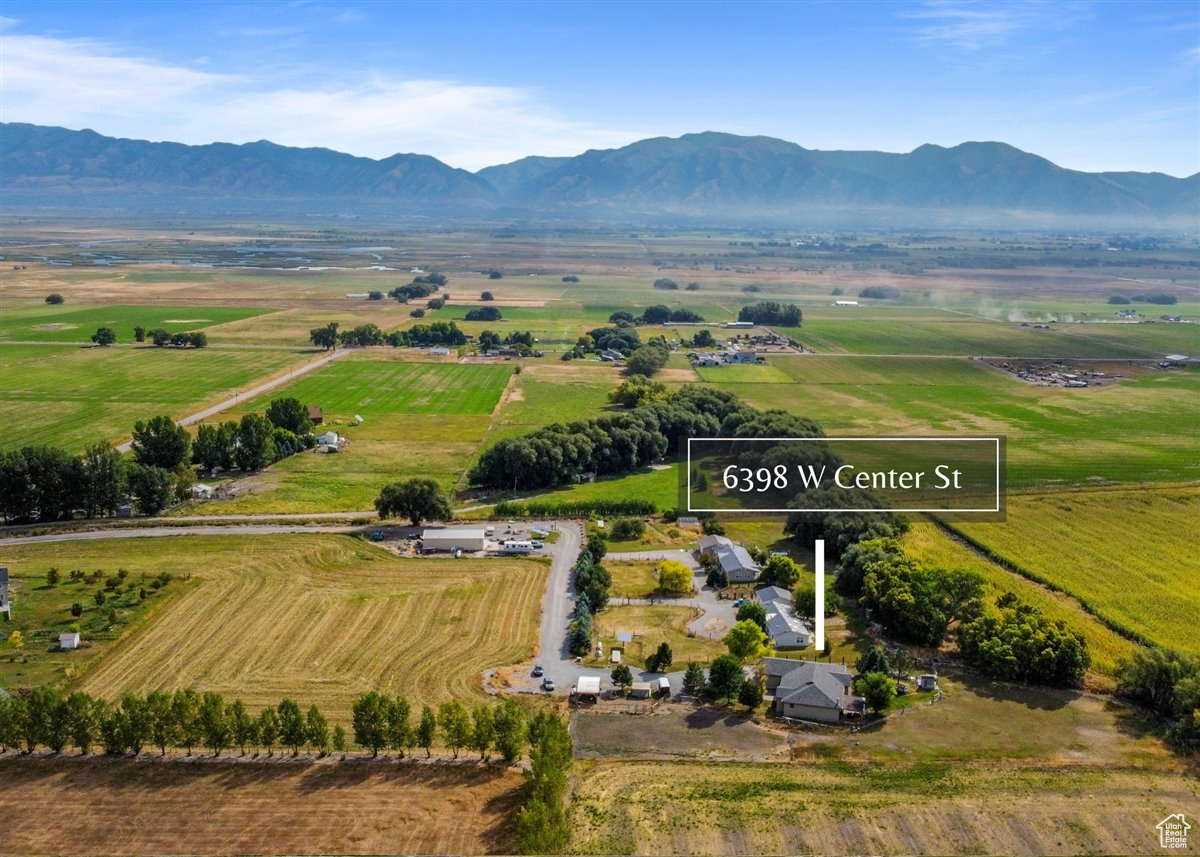 Drone / aerial view with a mountain view and a rural view