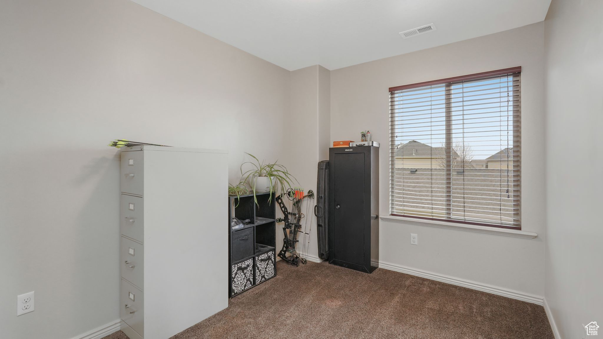 Bedroom room with carpet flooring