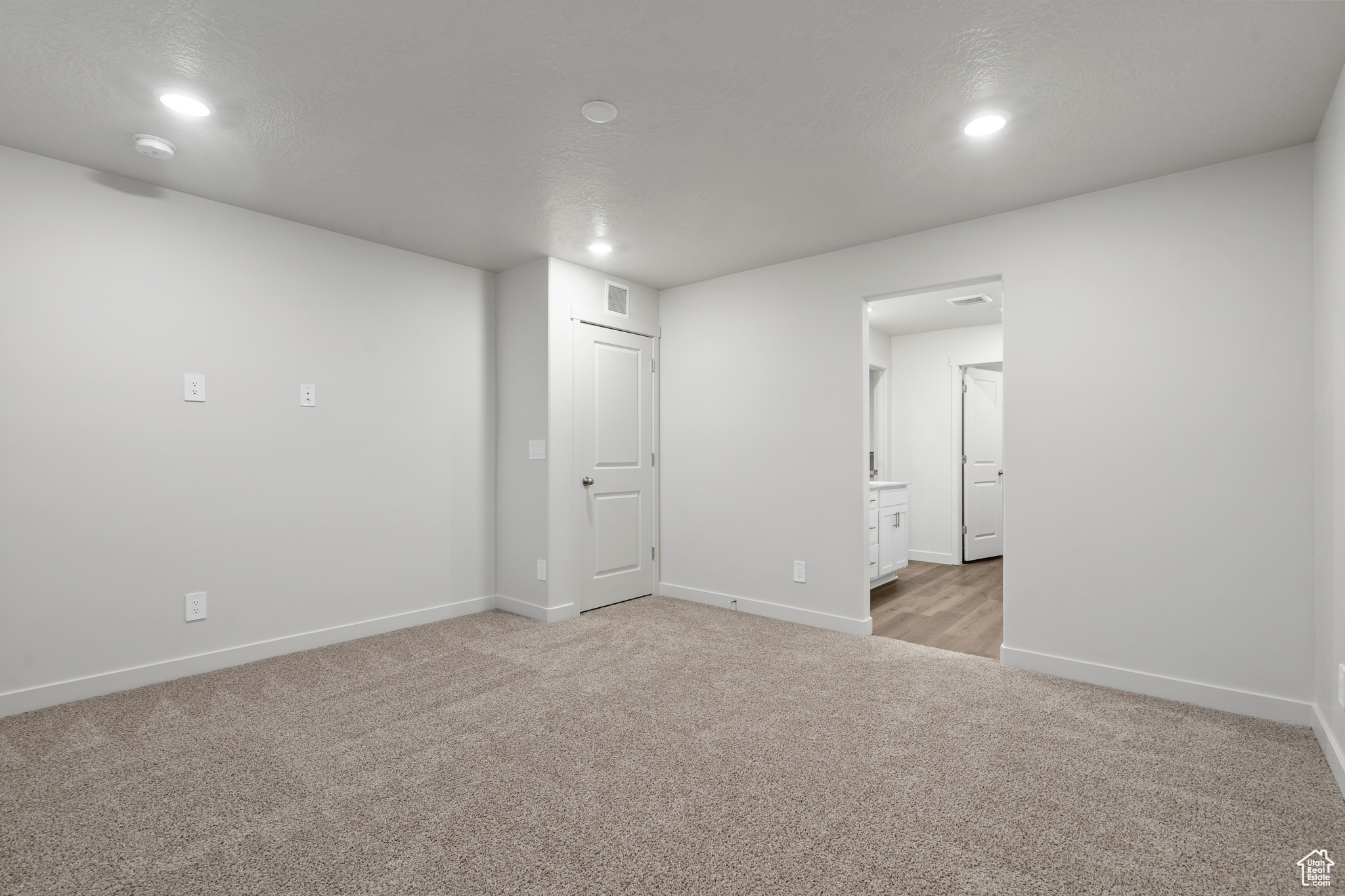 View of carpeted spare room