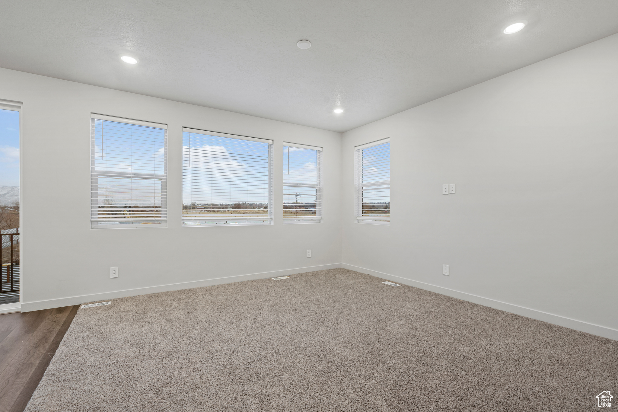 Empty room featuring carpet