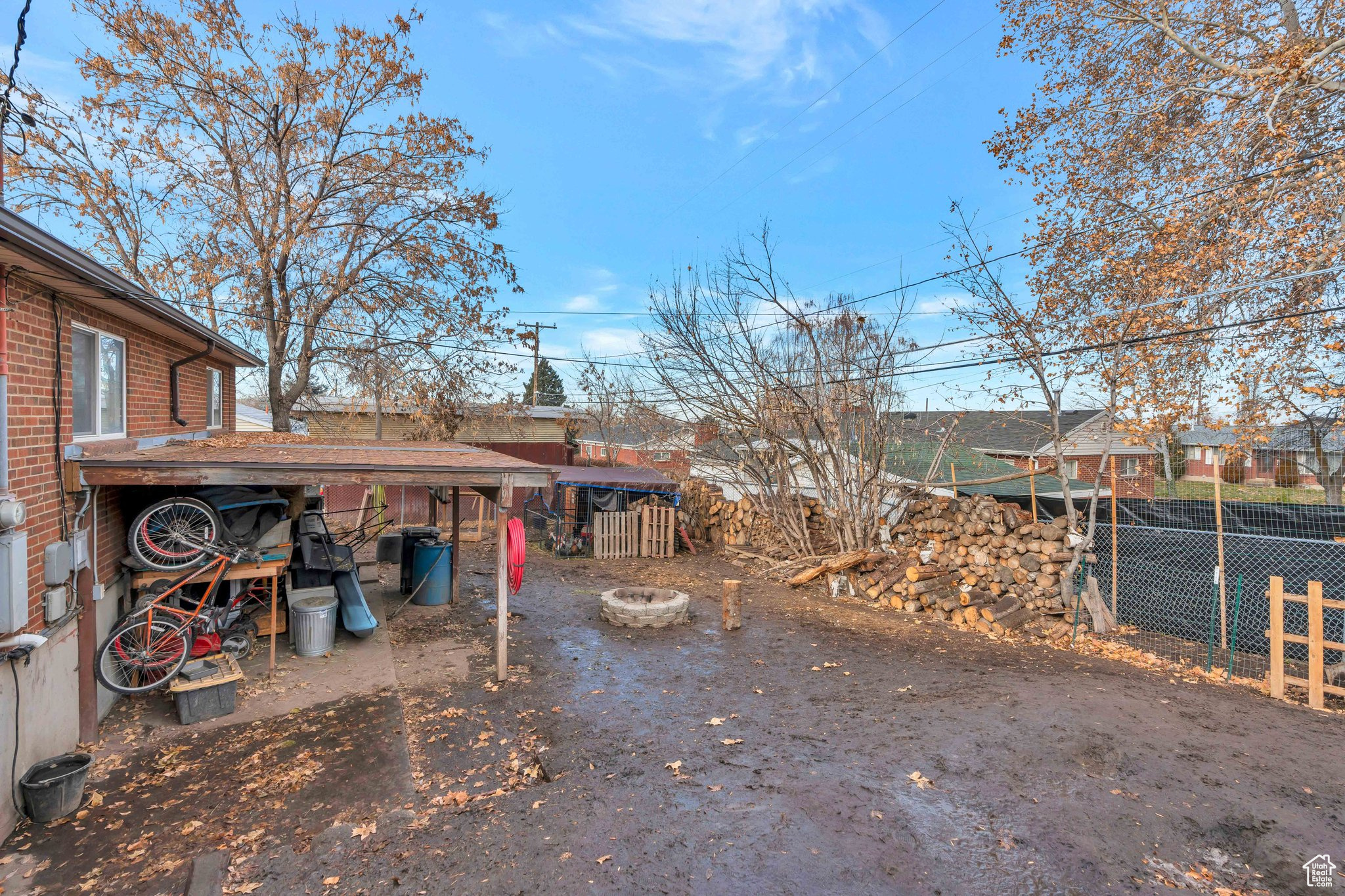 View of yard featuring a fire pit