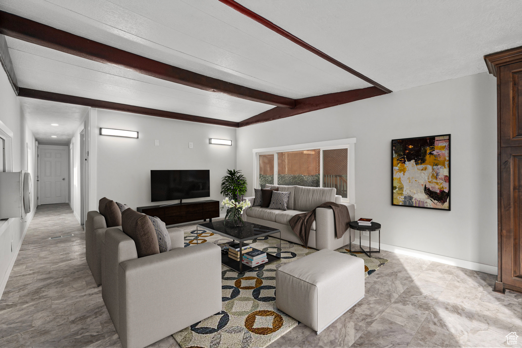 Living room with beamed ceiling