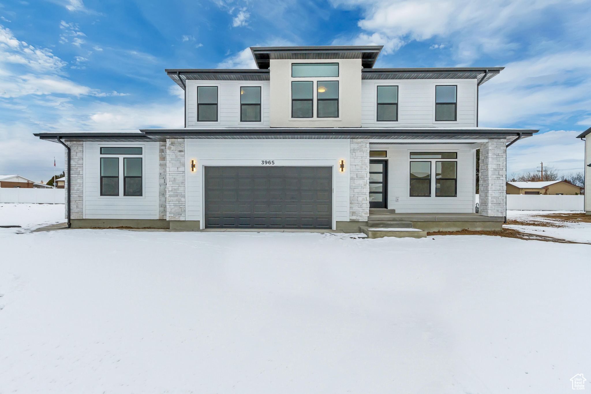 View of front of home with a garage