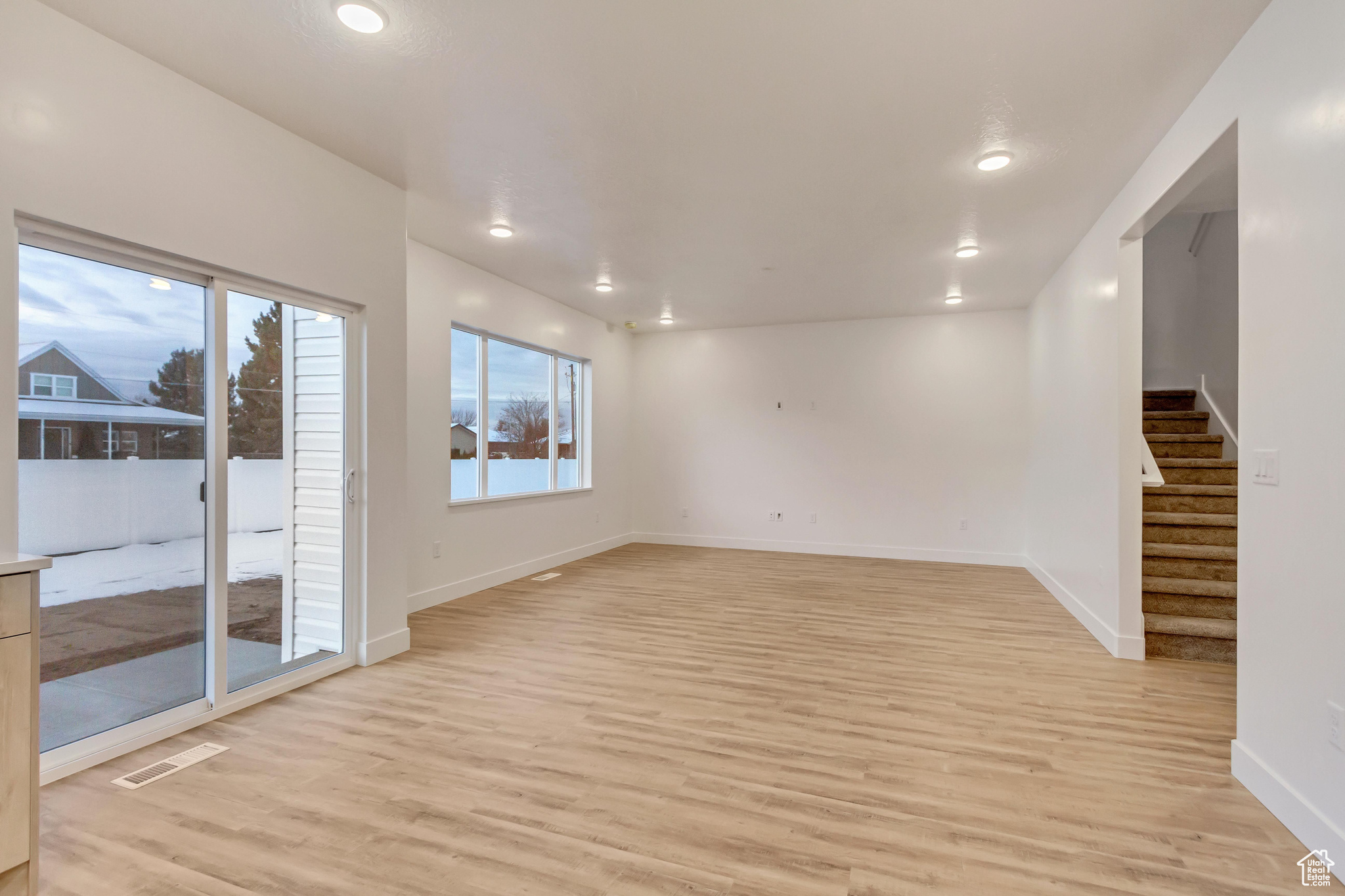 Spare room with light hardwood / wood-style floors