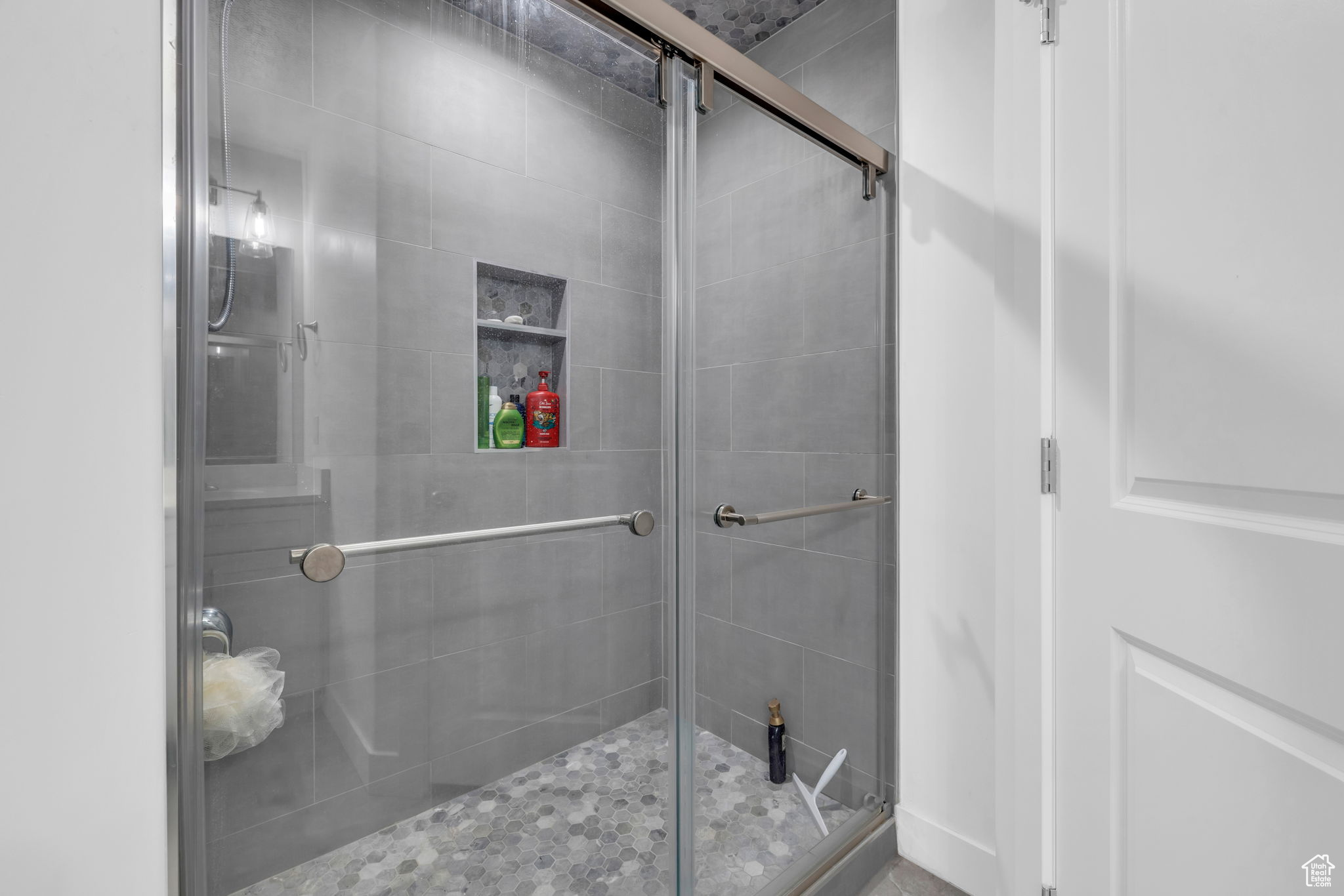 Bathroom featuring walk in shower