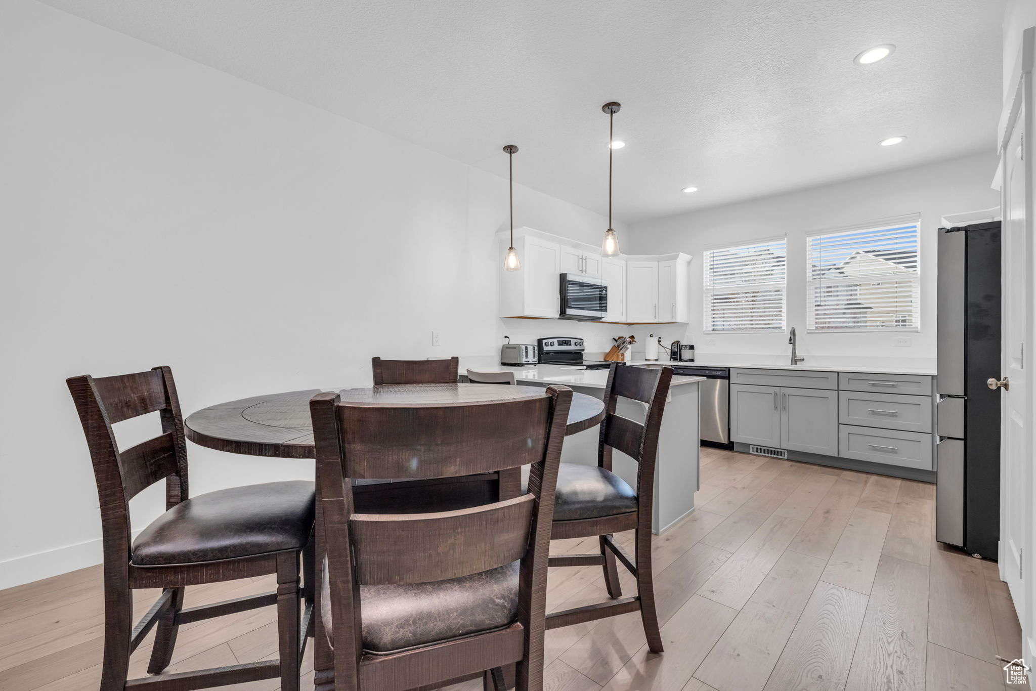 Dining space featuring light hardwood / wood-style floors