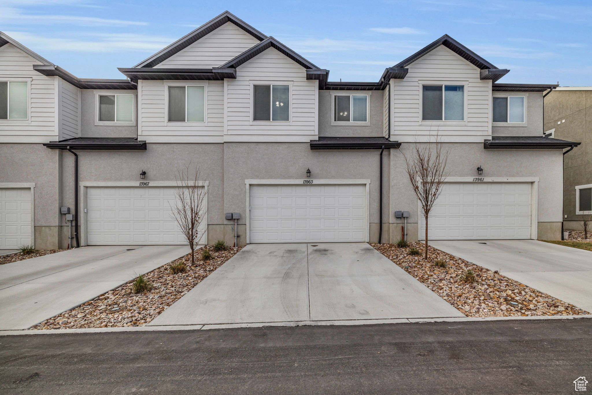 View of property featuring a garage