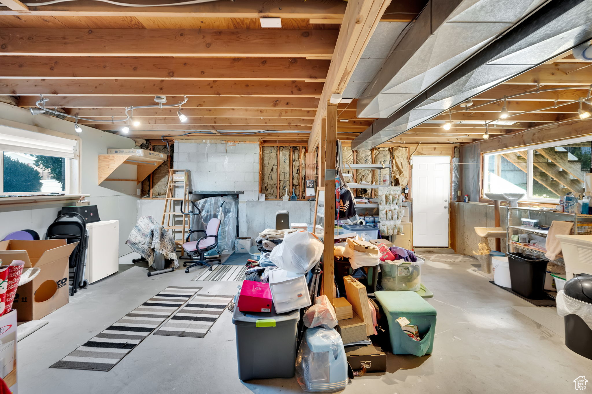 Basement featuring a wealth of natural light