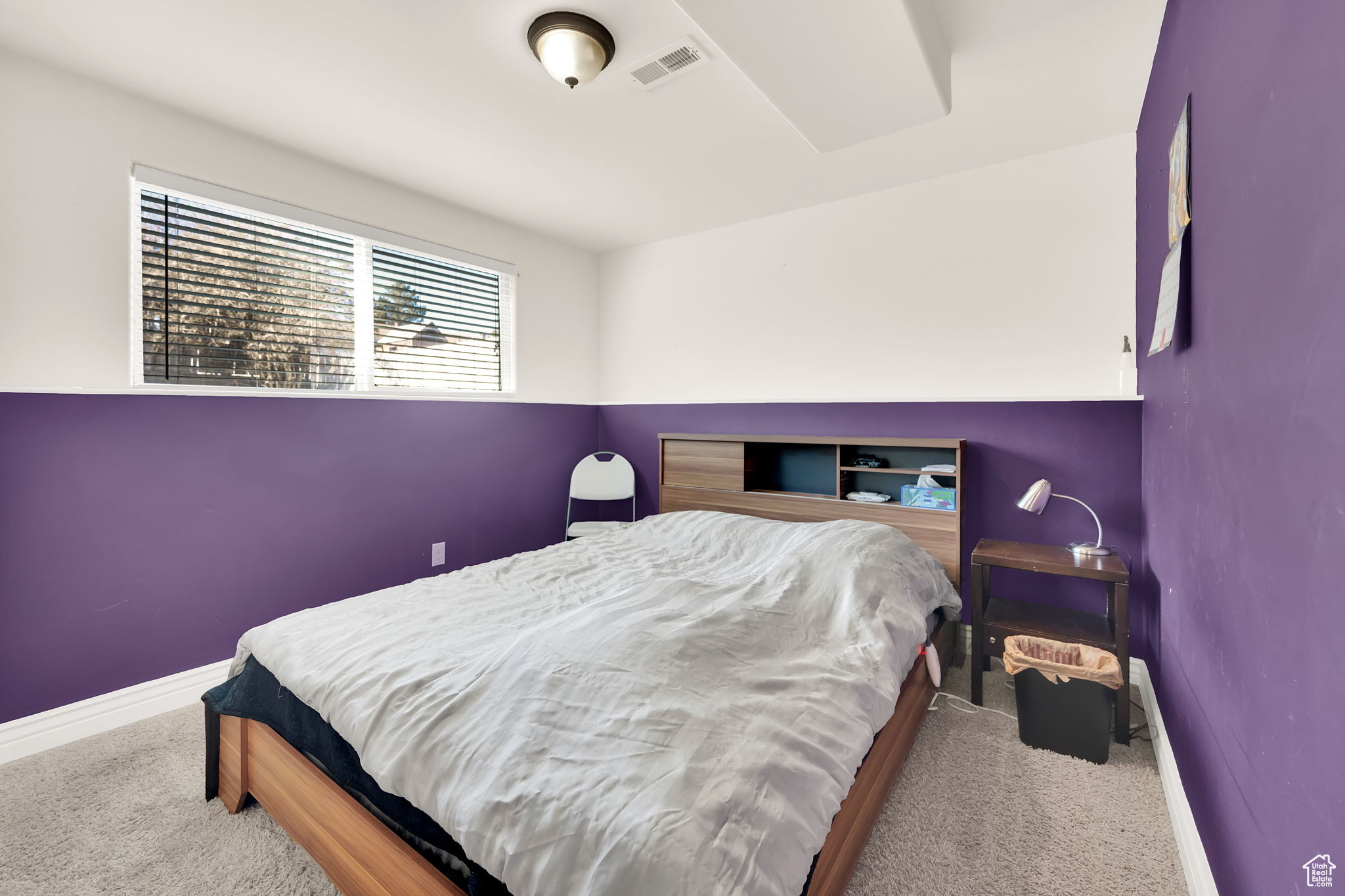 Bedroom featuring carpet flooring