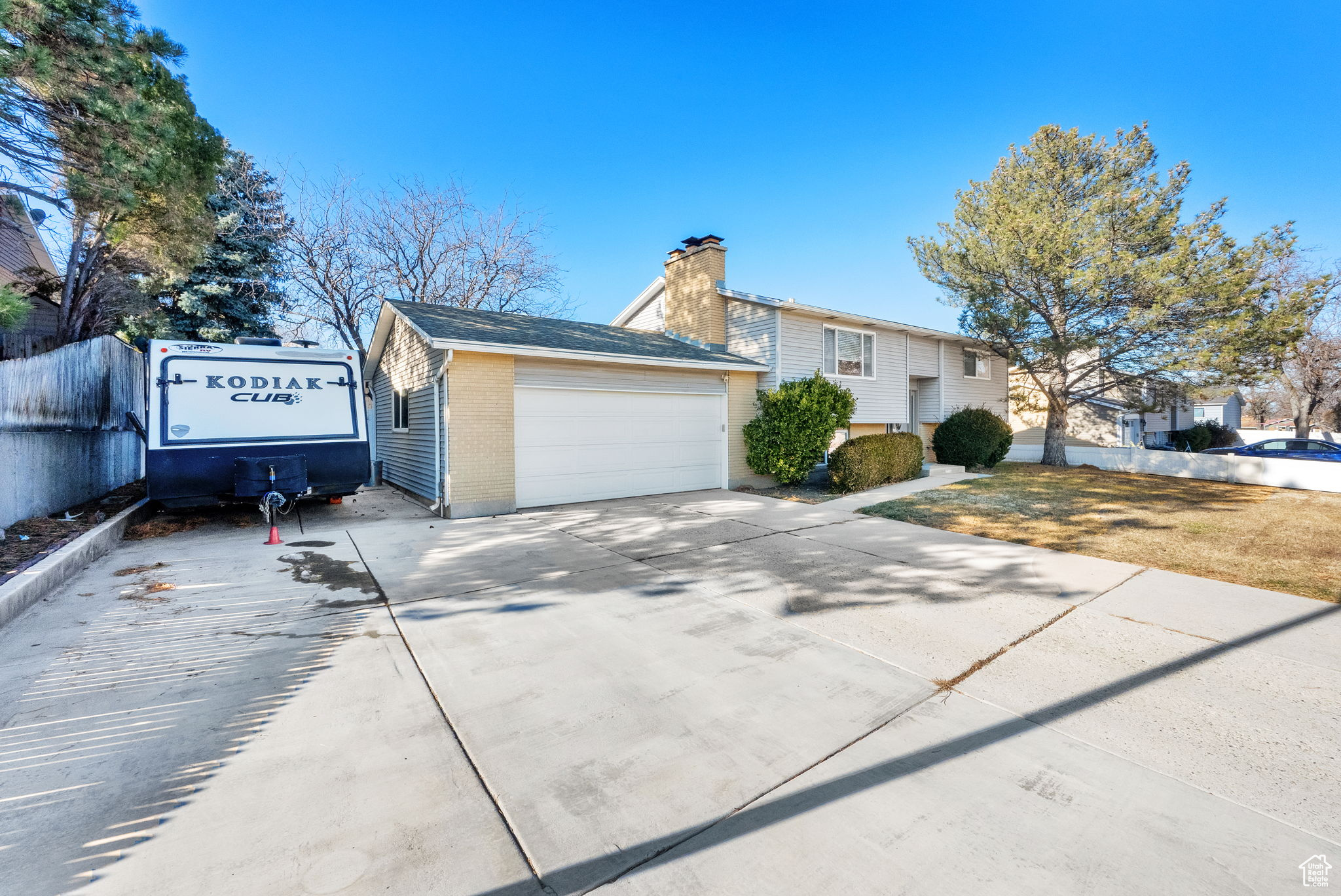 View of front of property with a garage