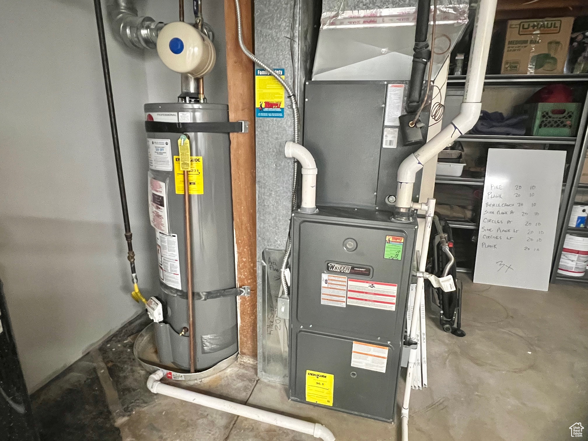 Utility room with gas water heater