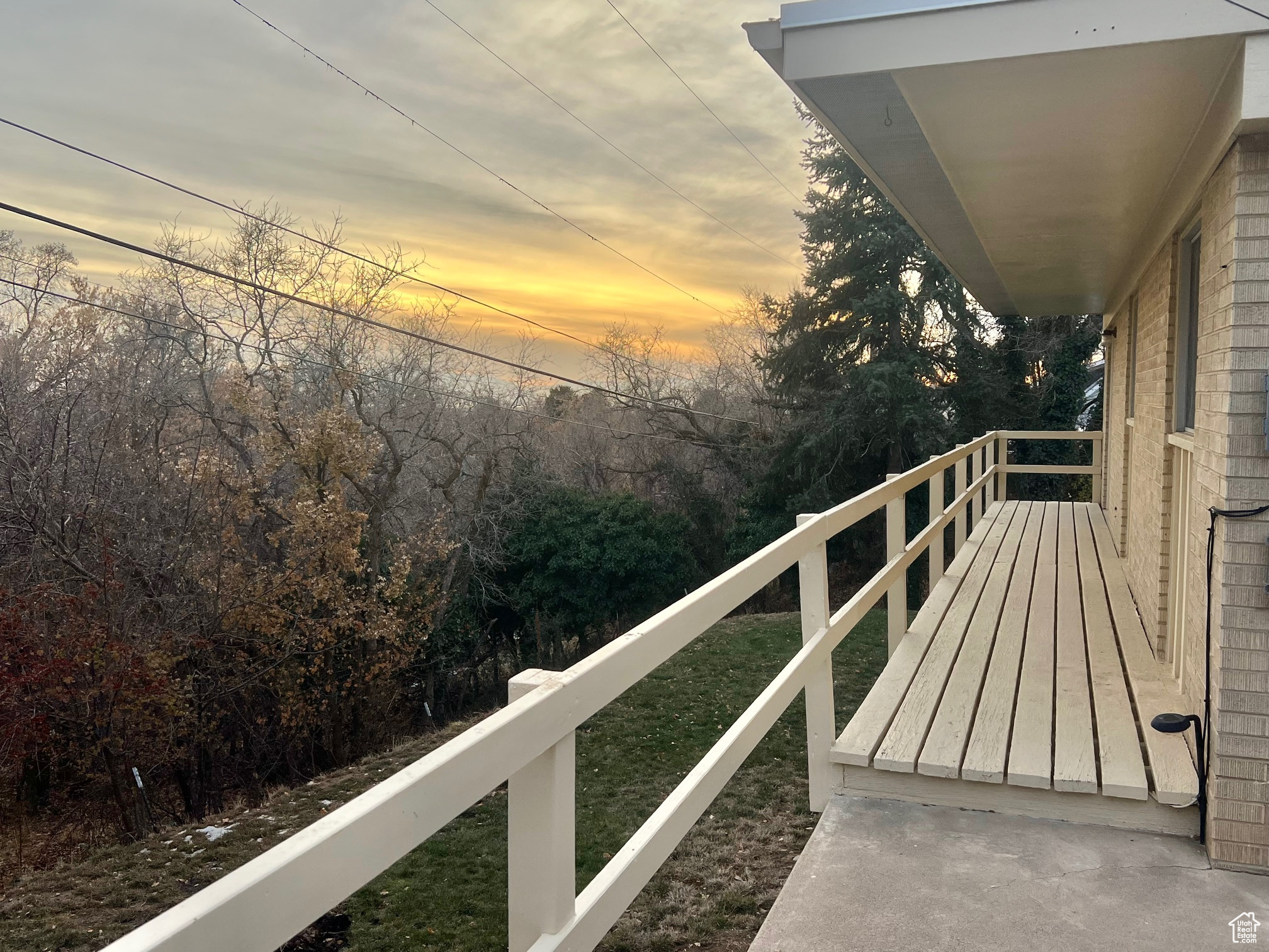 View of balcony at dusk