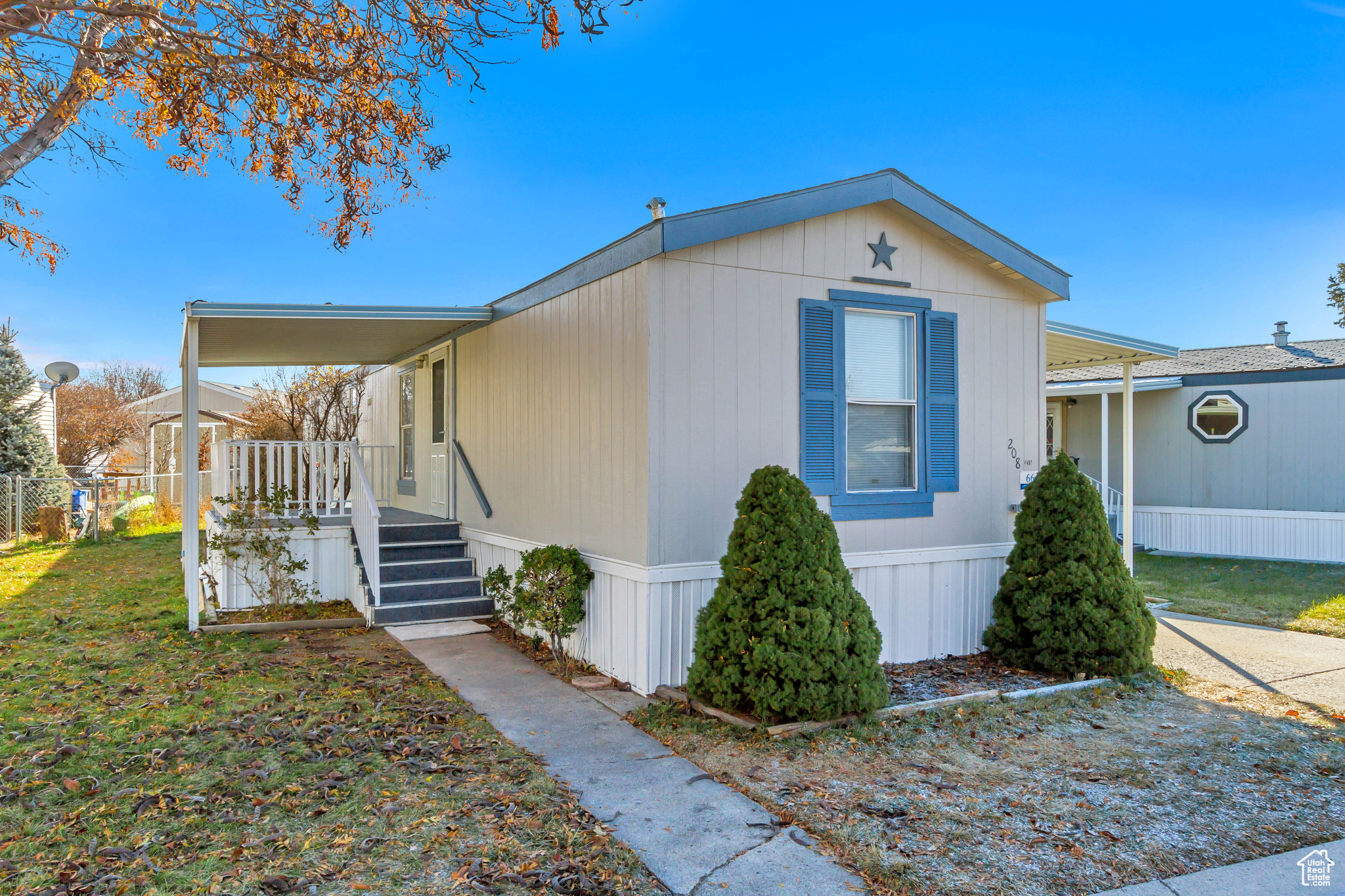 Exterior space with a yard and covered porch