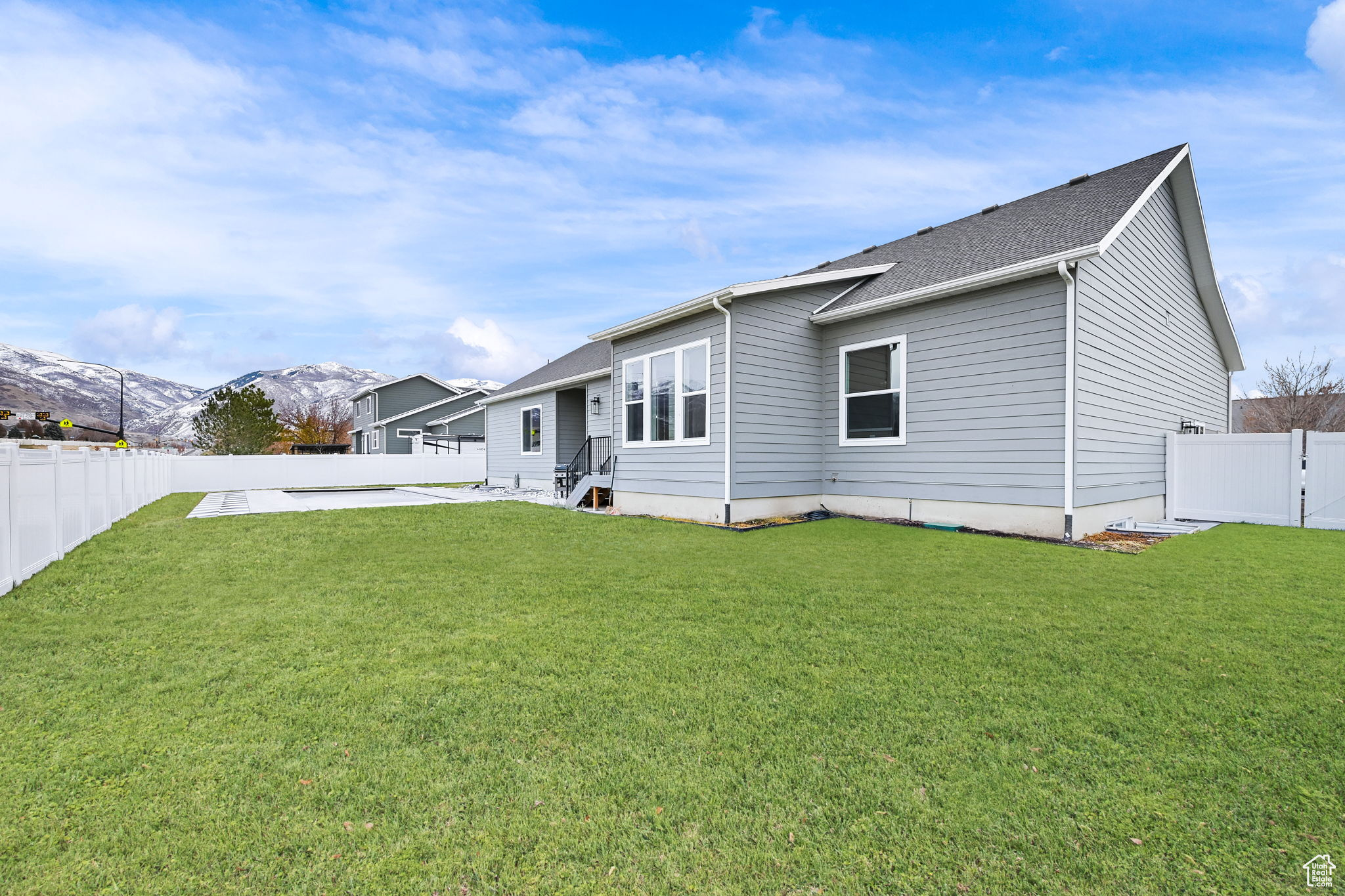 Back of the house view - There is a full size in-ground pool plus plenty of yard space remaining.