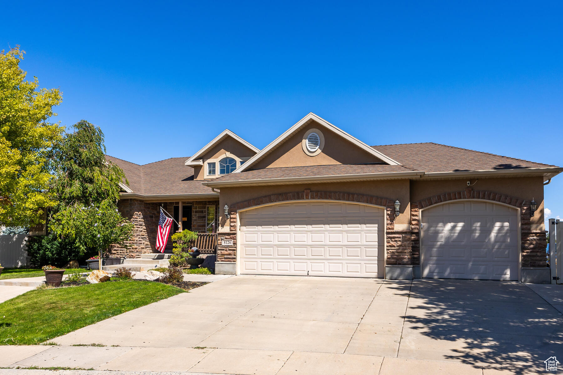 View of front of home featuring a garage