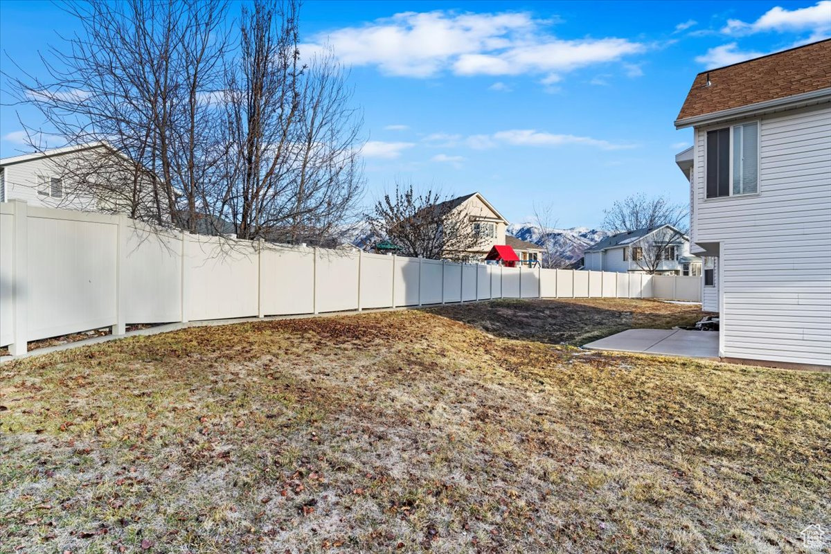 View of yard with a patio