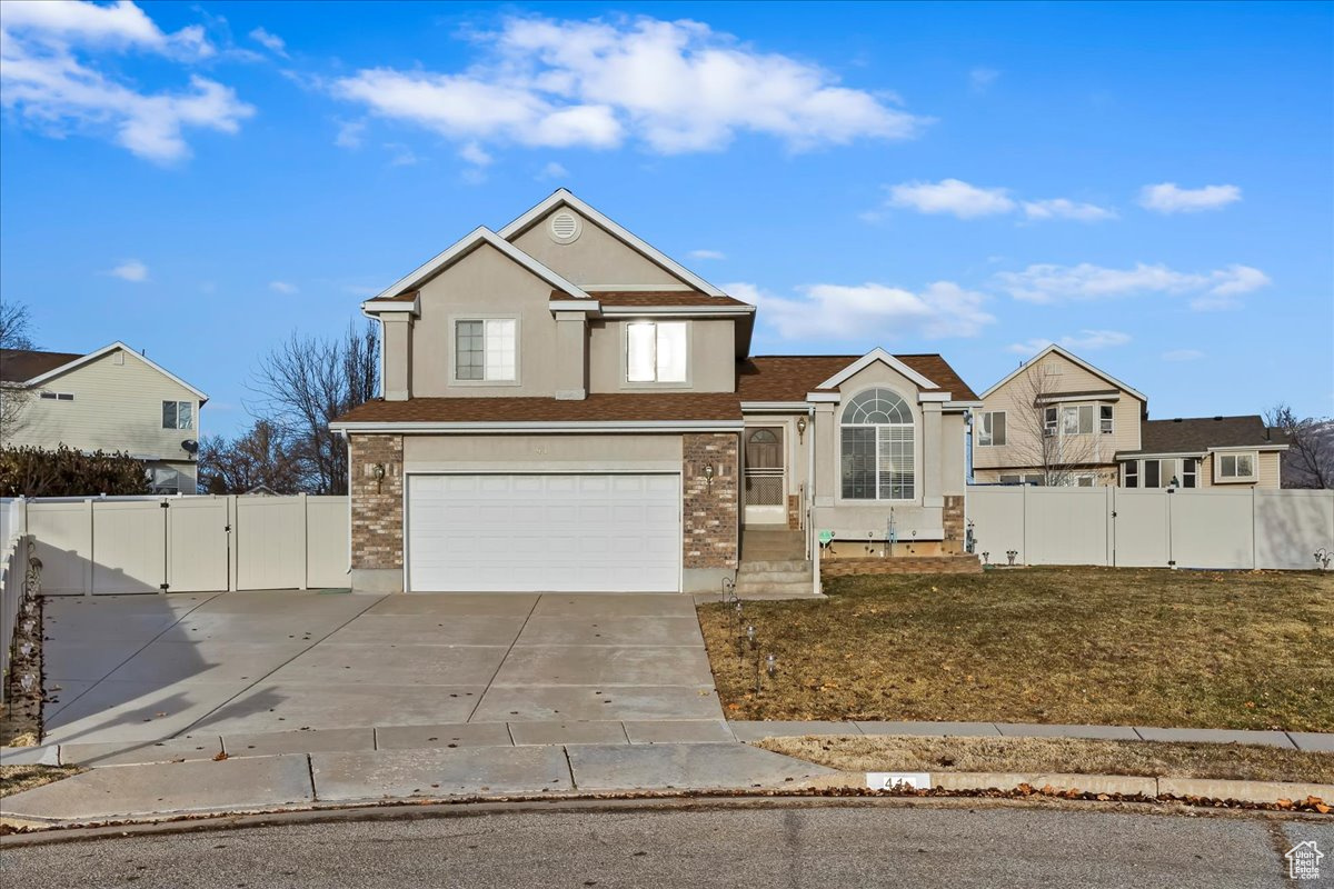 Front of property featuring a garage